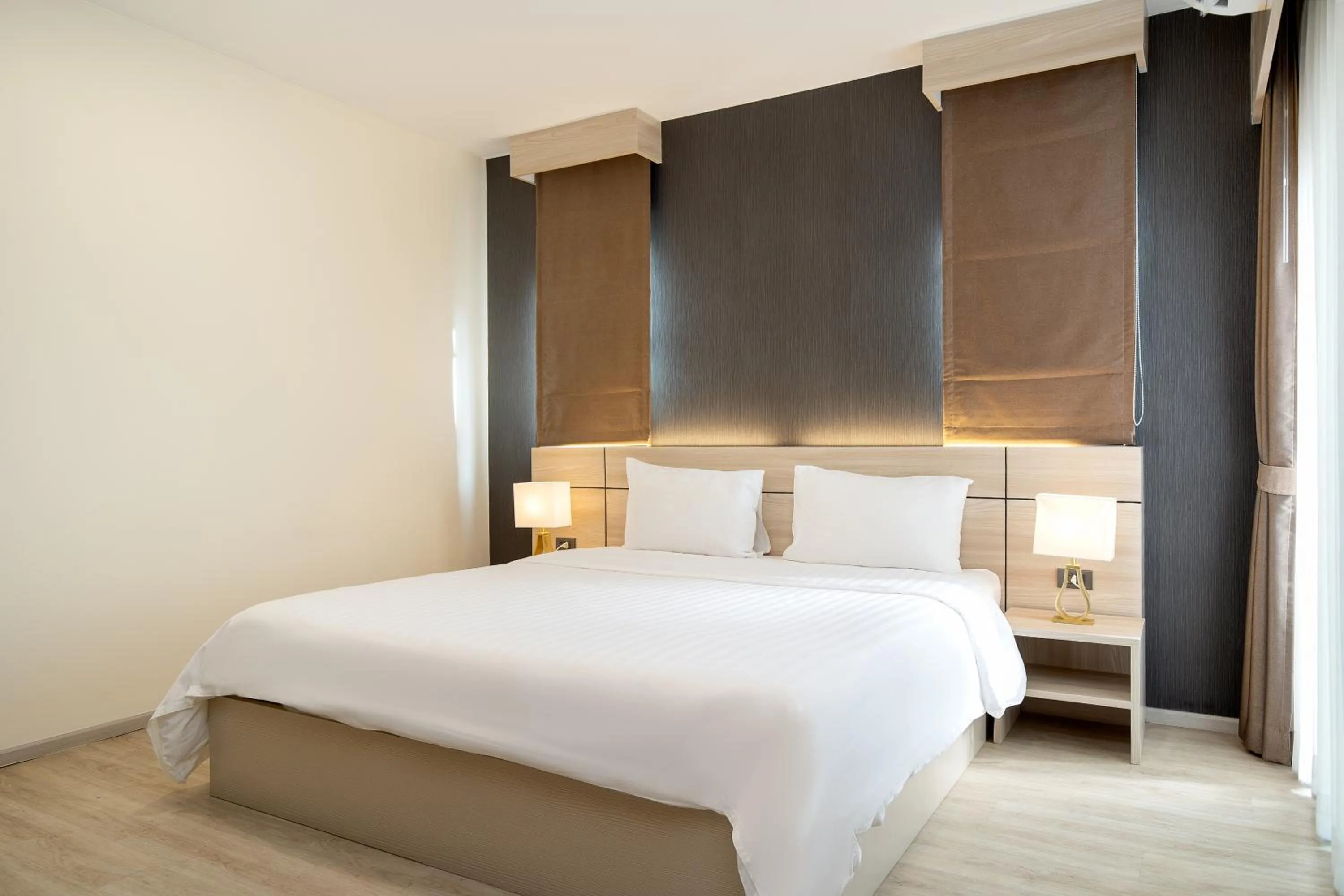 Bed in Amanah Bangkok Hotel