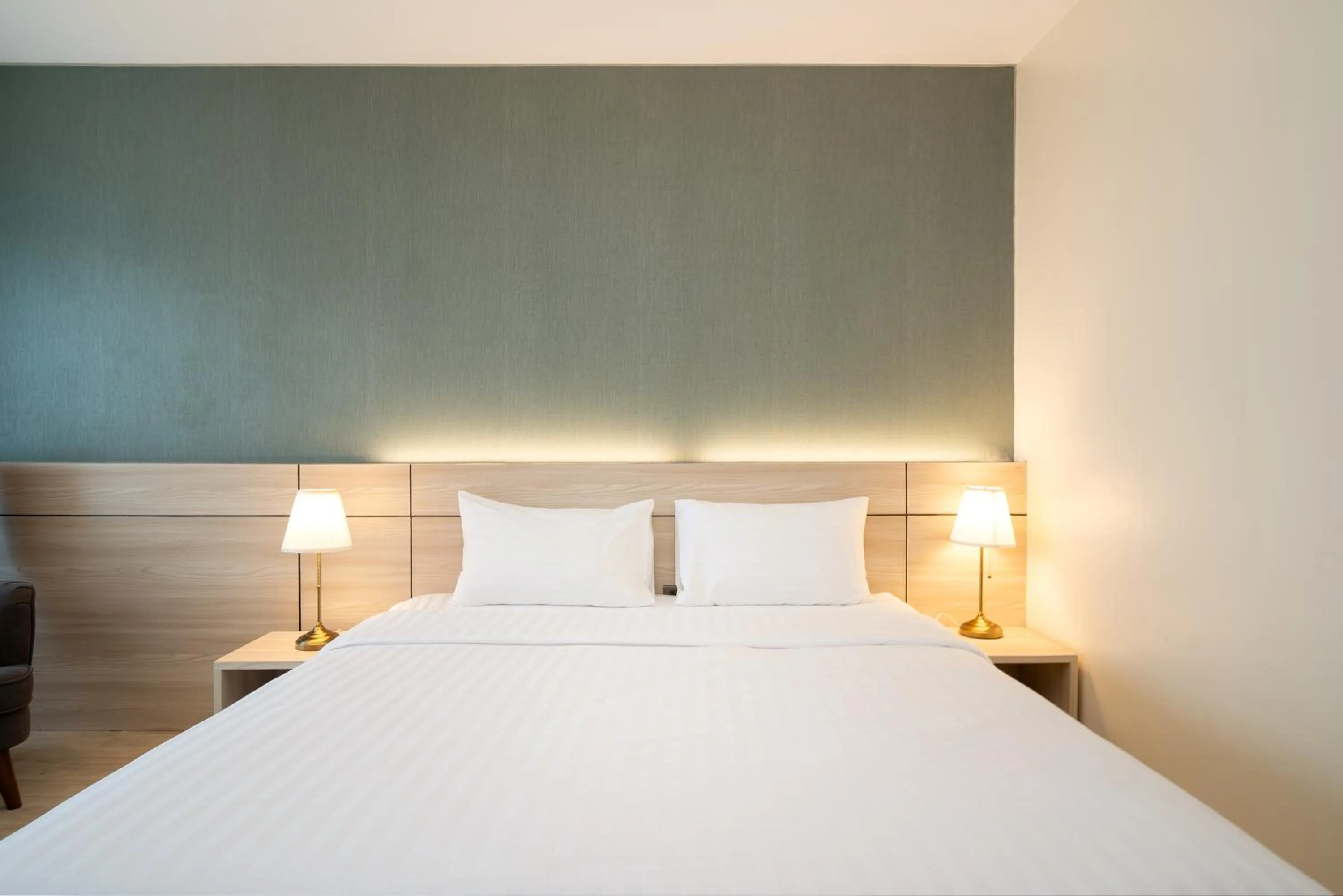 Bed in Amanah Bangkok Hotel