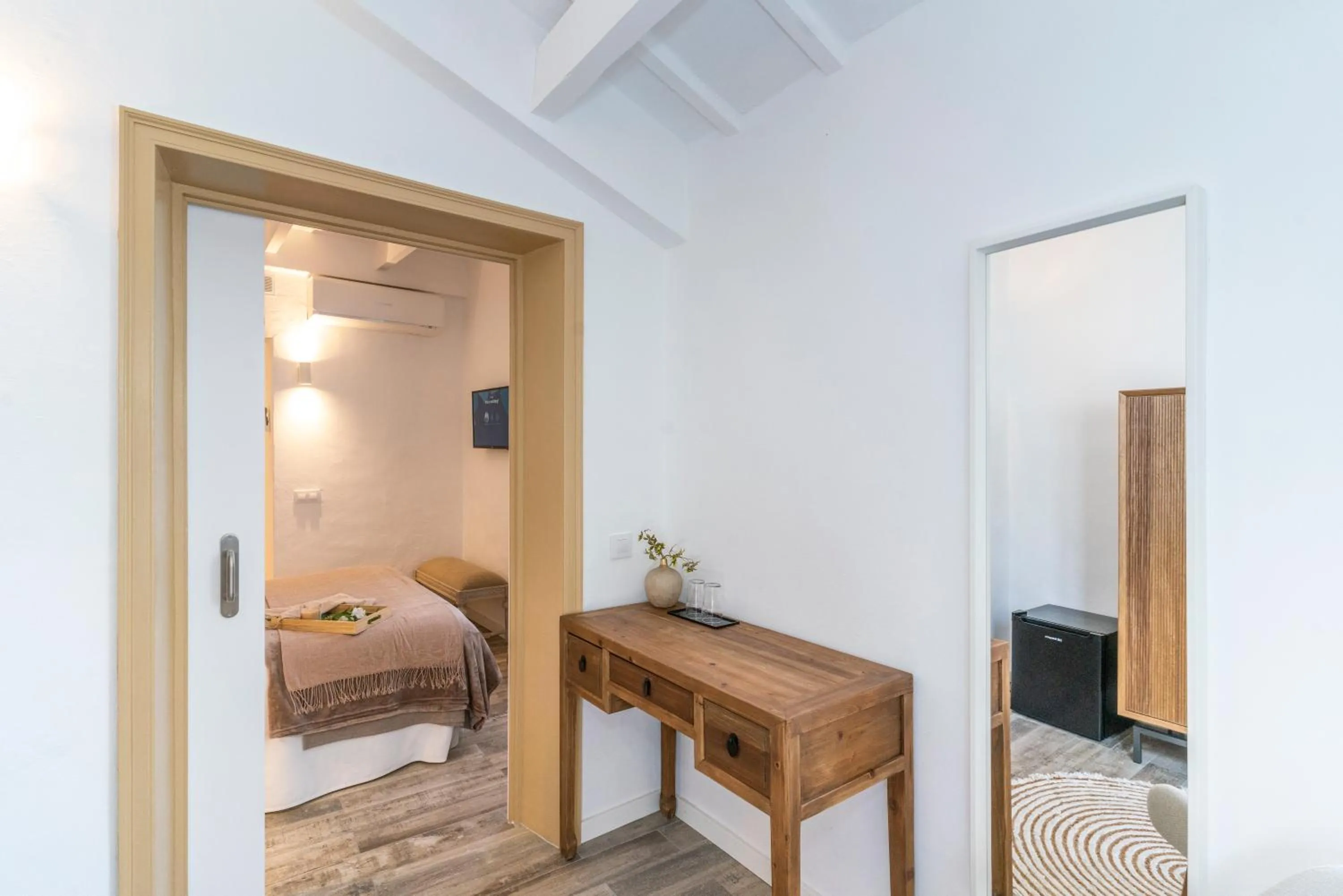 Living room, Bed in Encant de Alaior Boutique Hotel