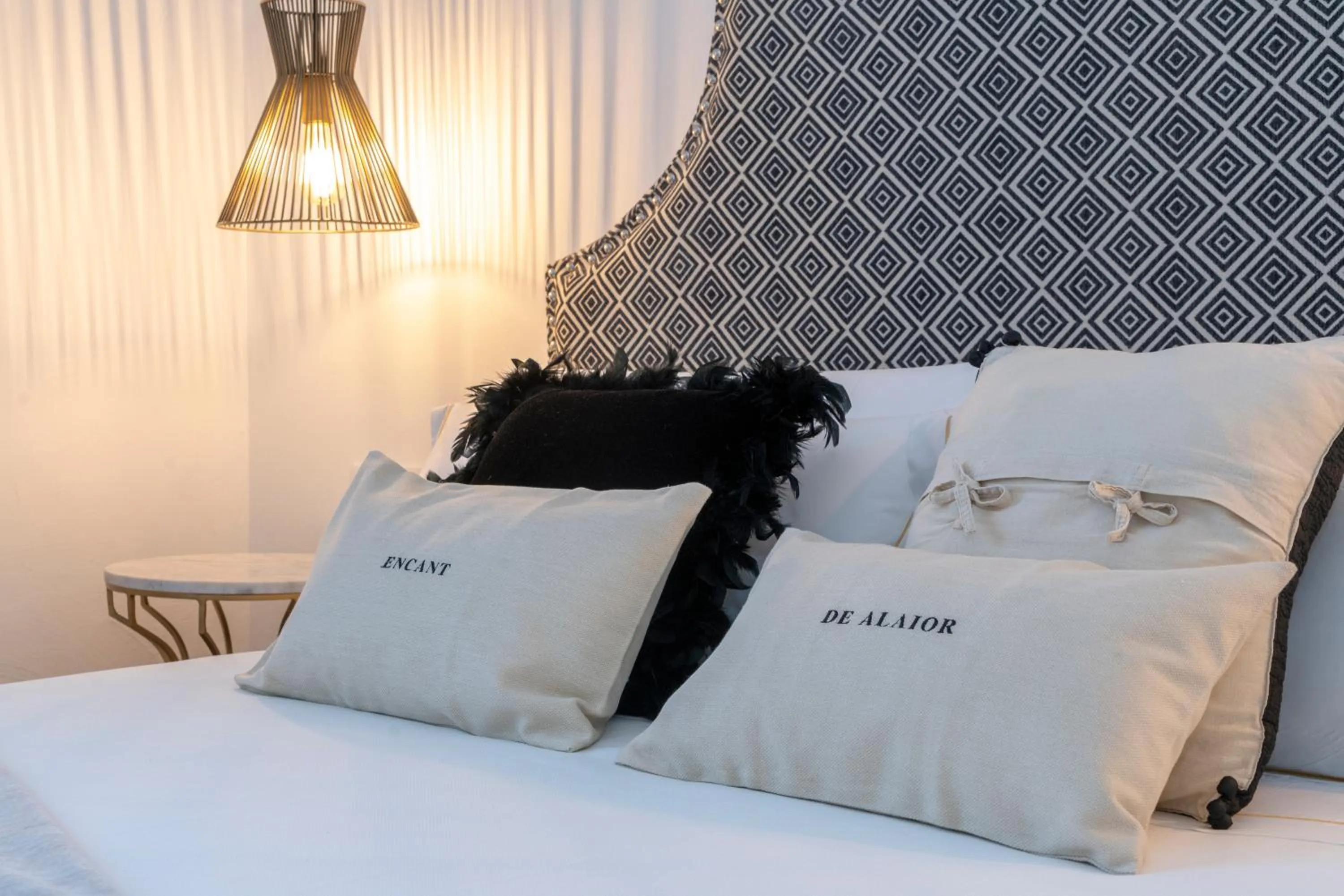 Bed in Encant de Alaior Boutique Hotel