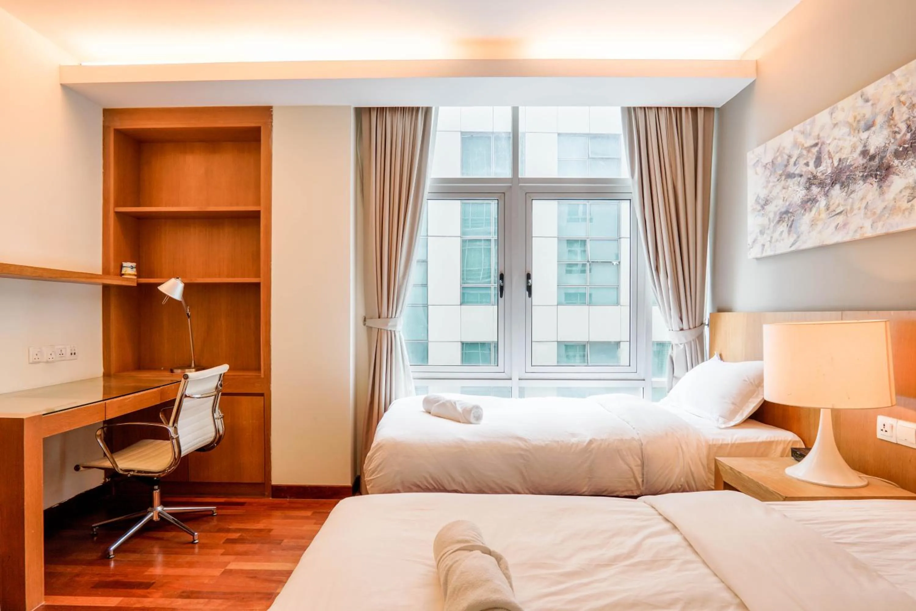 Bed in Lot 163 at Cormar Suites by Airhost