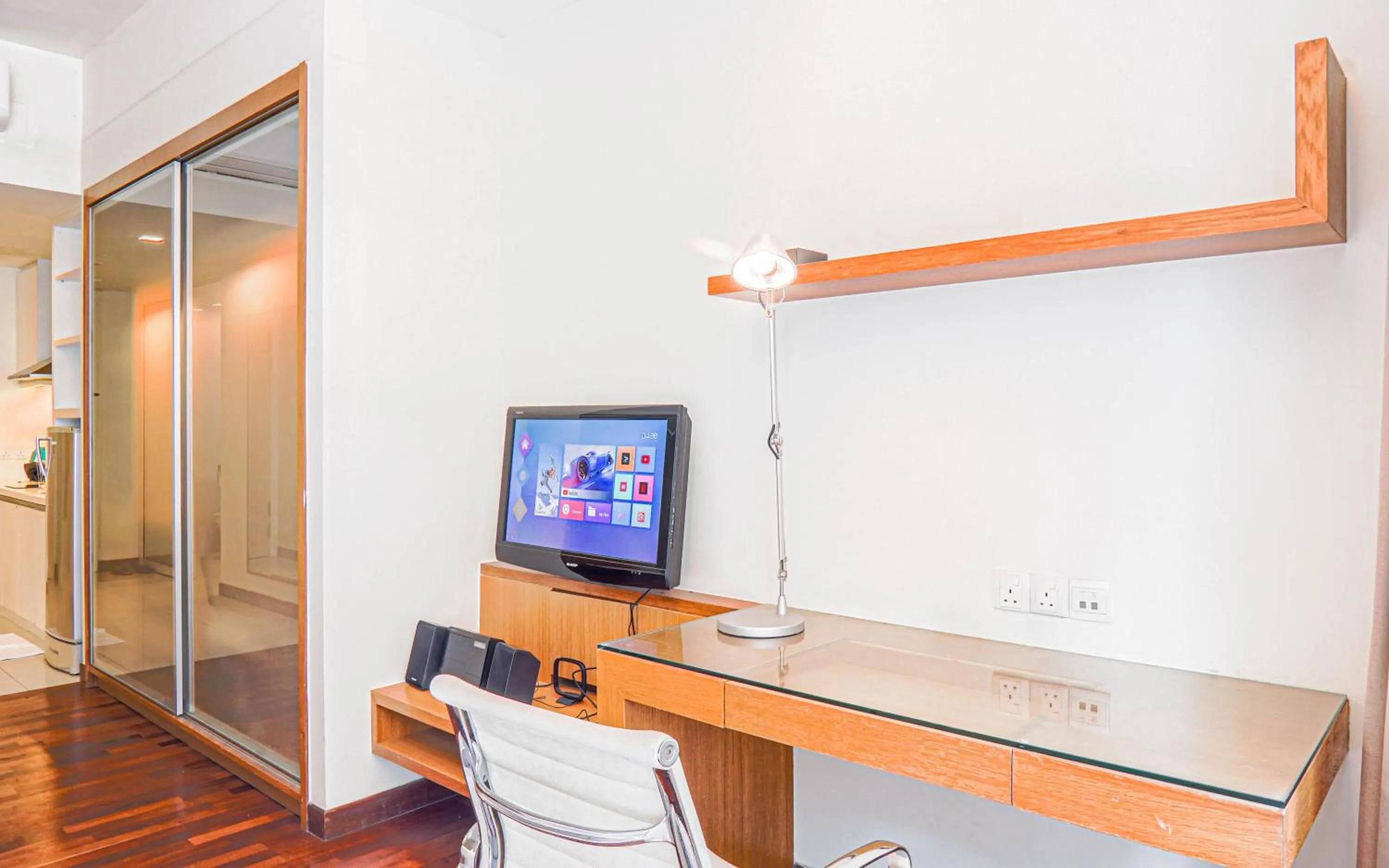 TV and multimedia in Lot 163 at Cormar Suites by Airhost