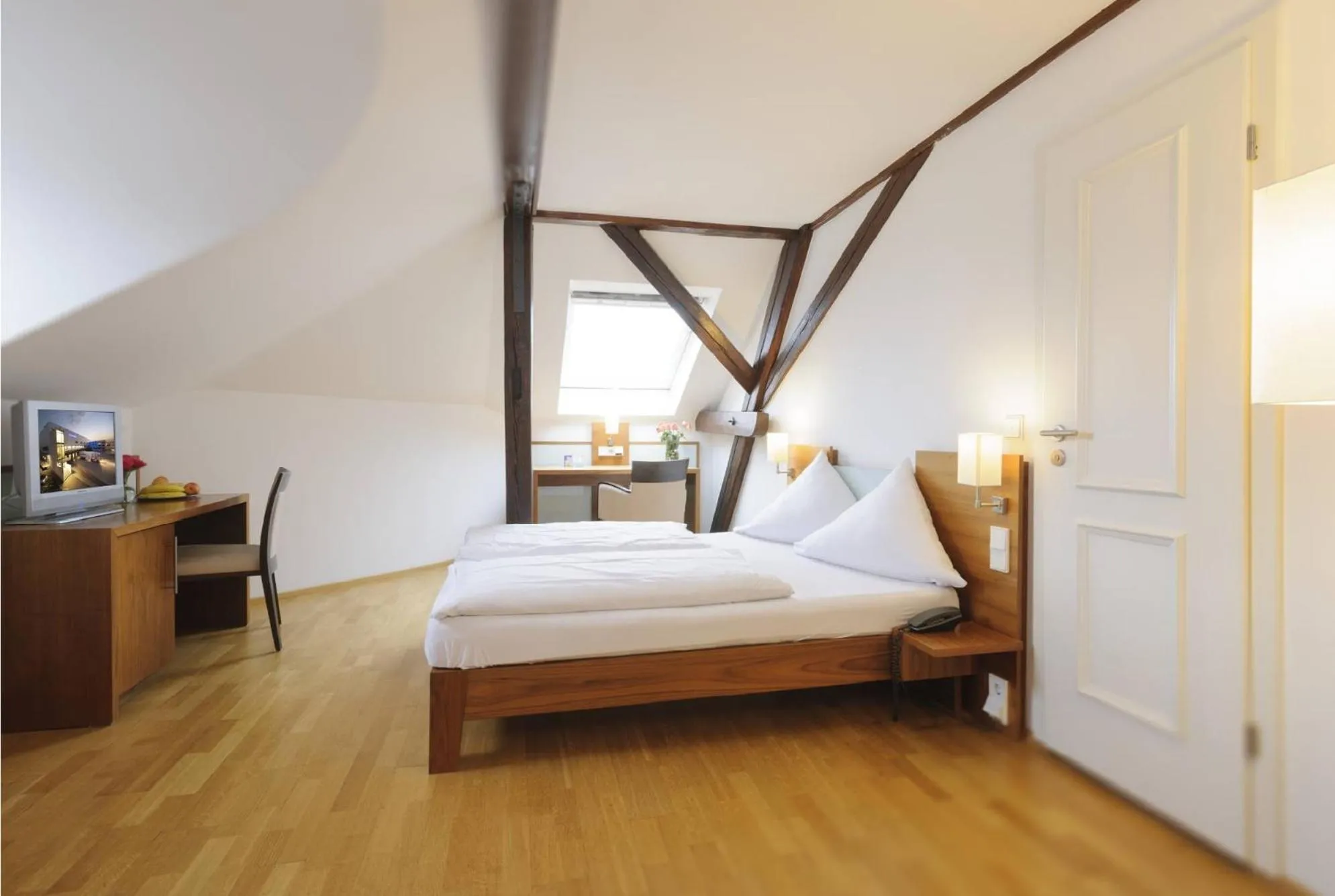Photo of the whole room, Bed in Hotel Augustiner Tor
