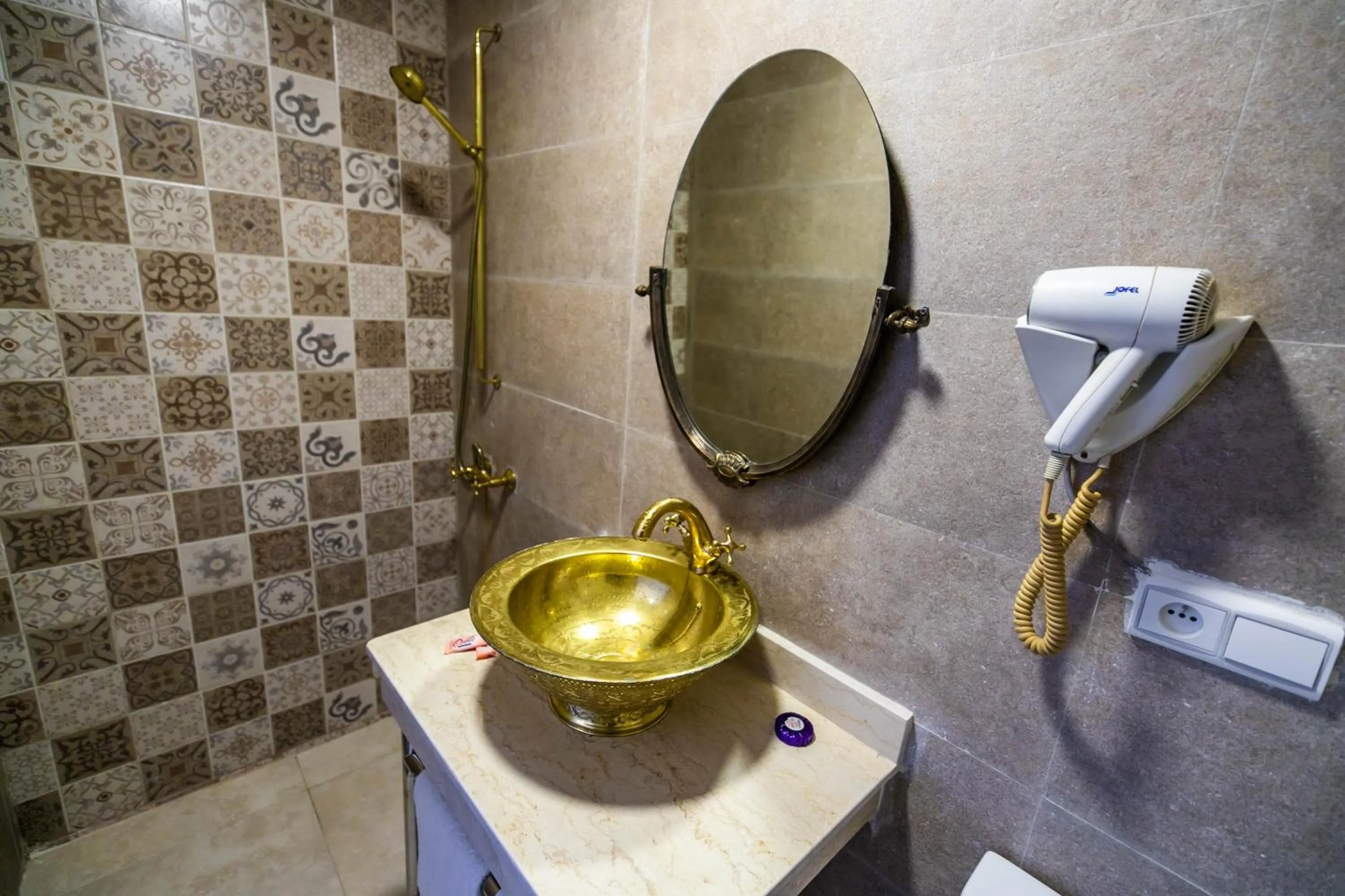 Bathroom in Palais Shazam & SPA