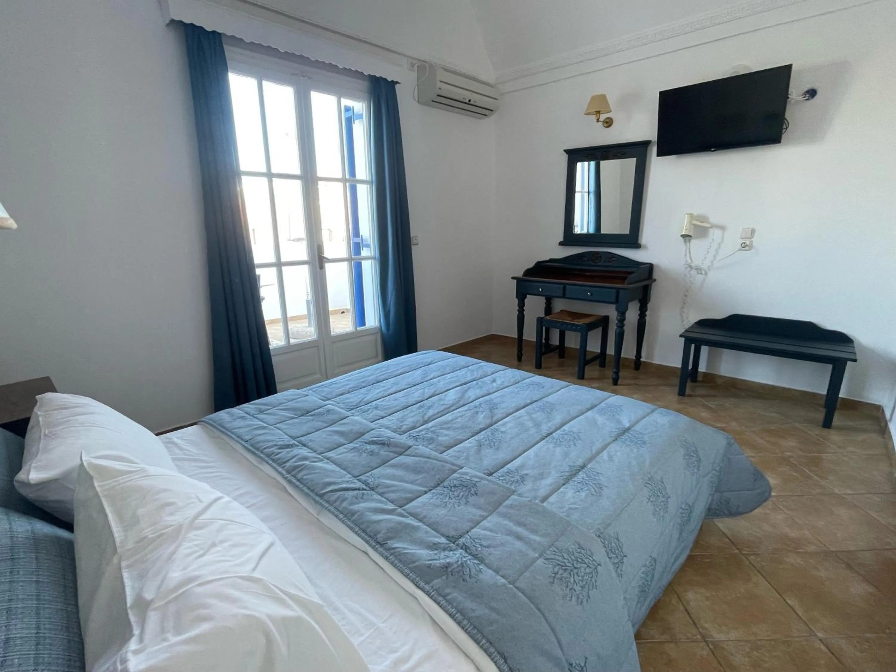 Bed in Leonidas Apartments