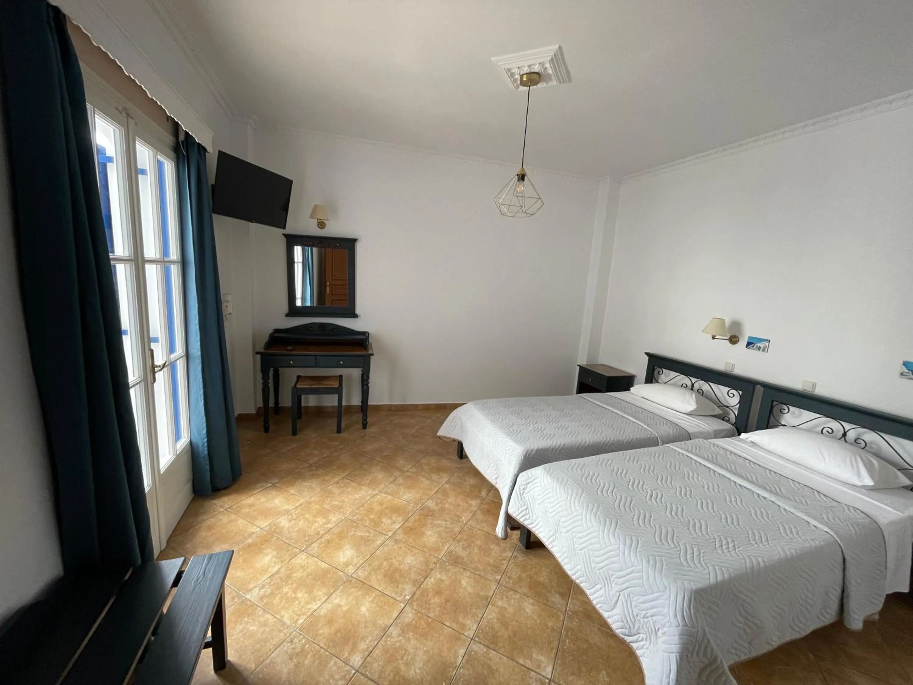 Bed in Leonidas Apartments