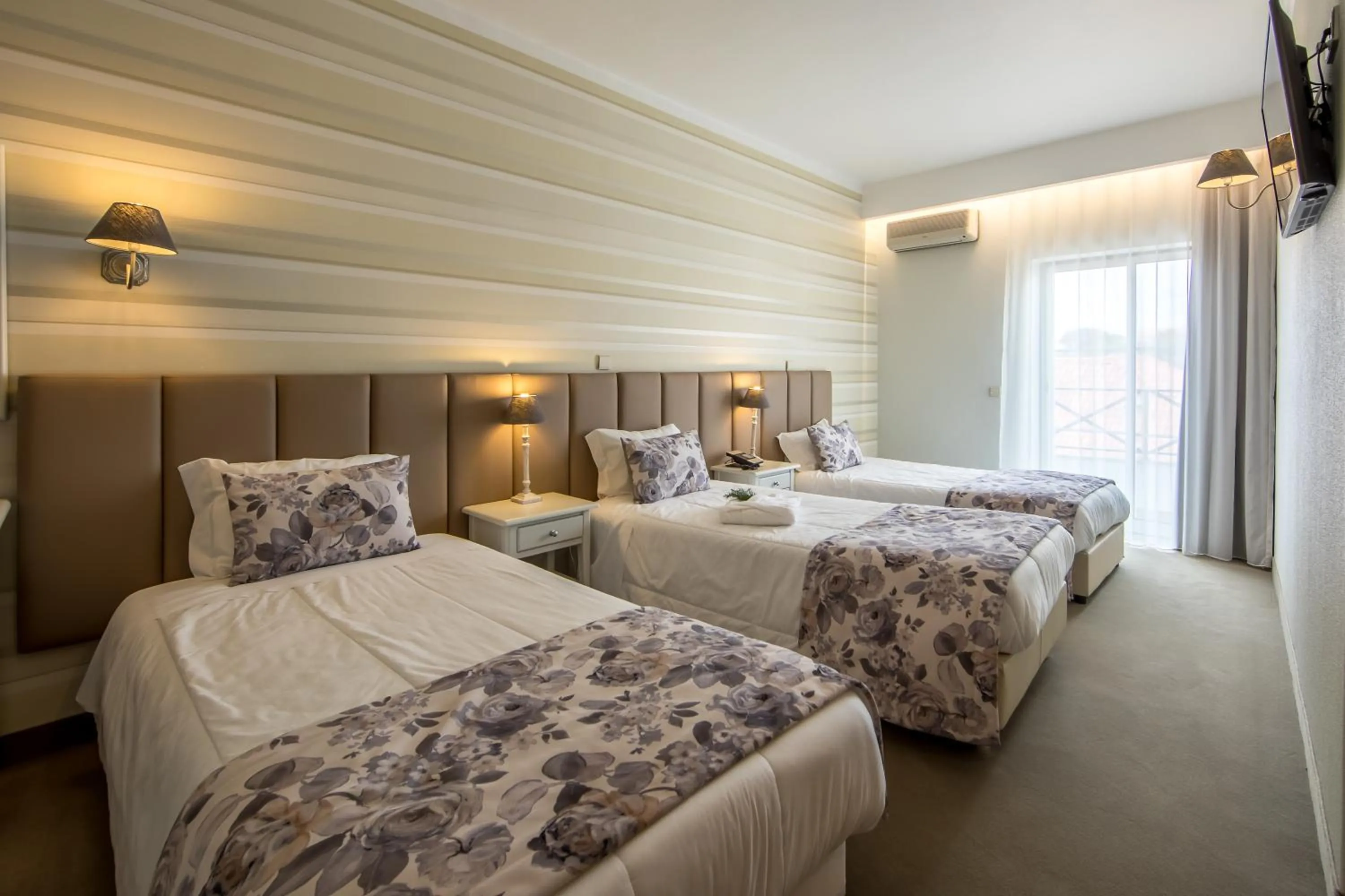 Bed in Hotel Alecrim