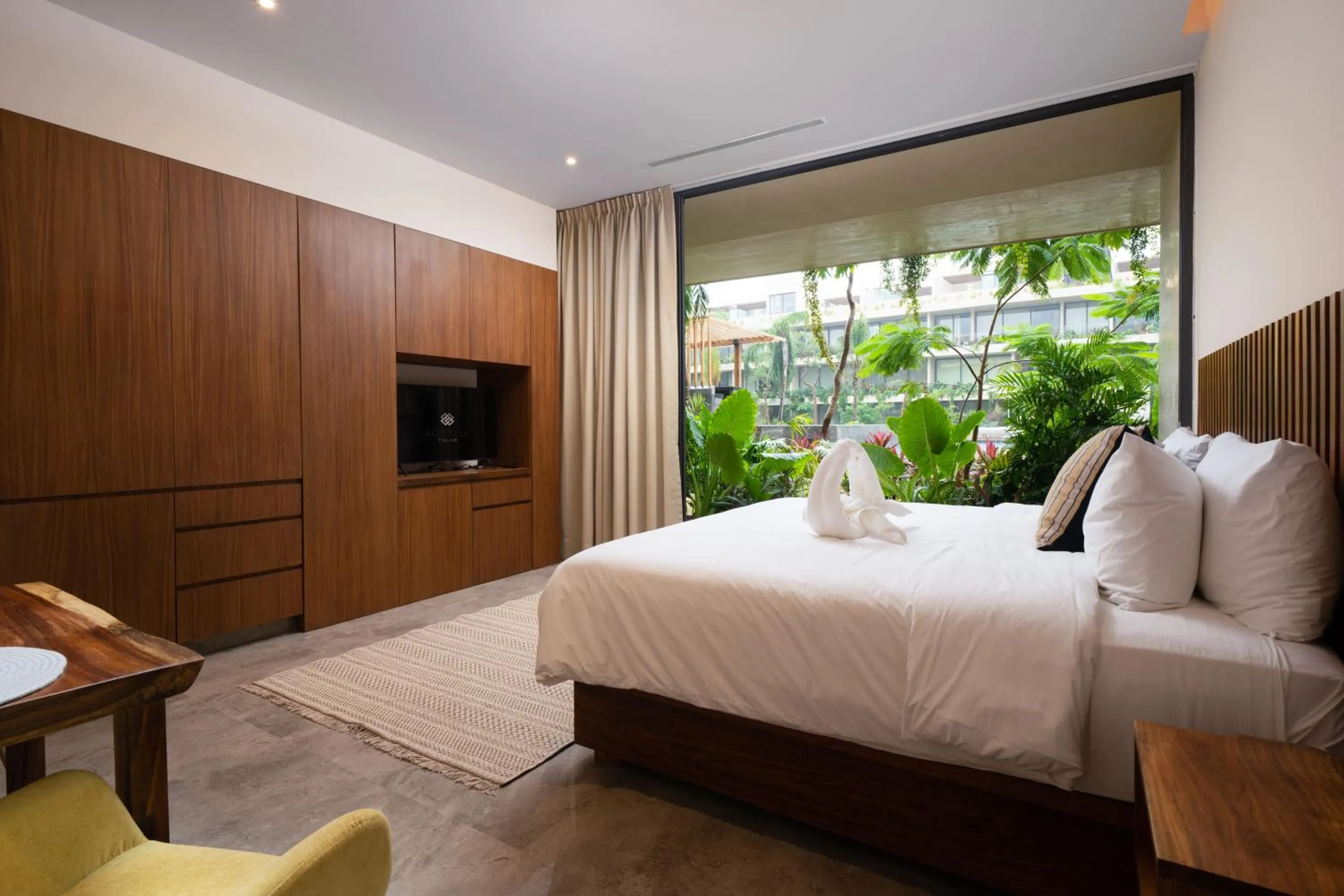 Photo of the whole room, Bed in Mistiq Tulum