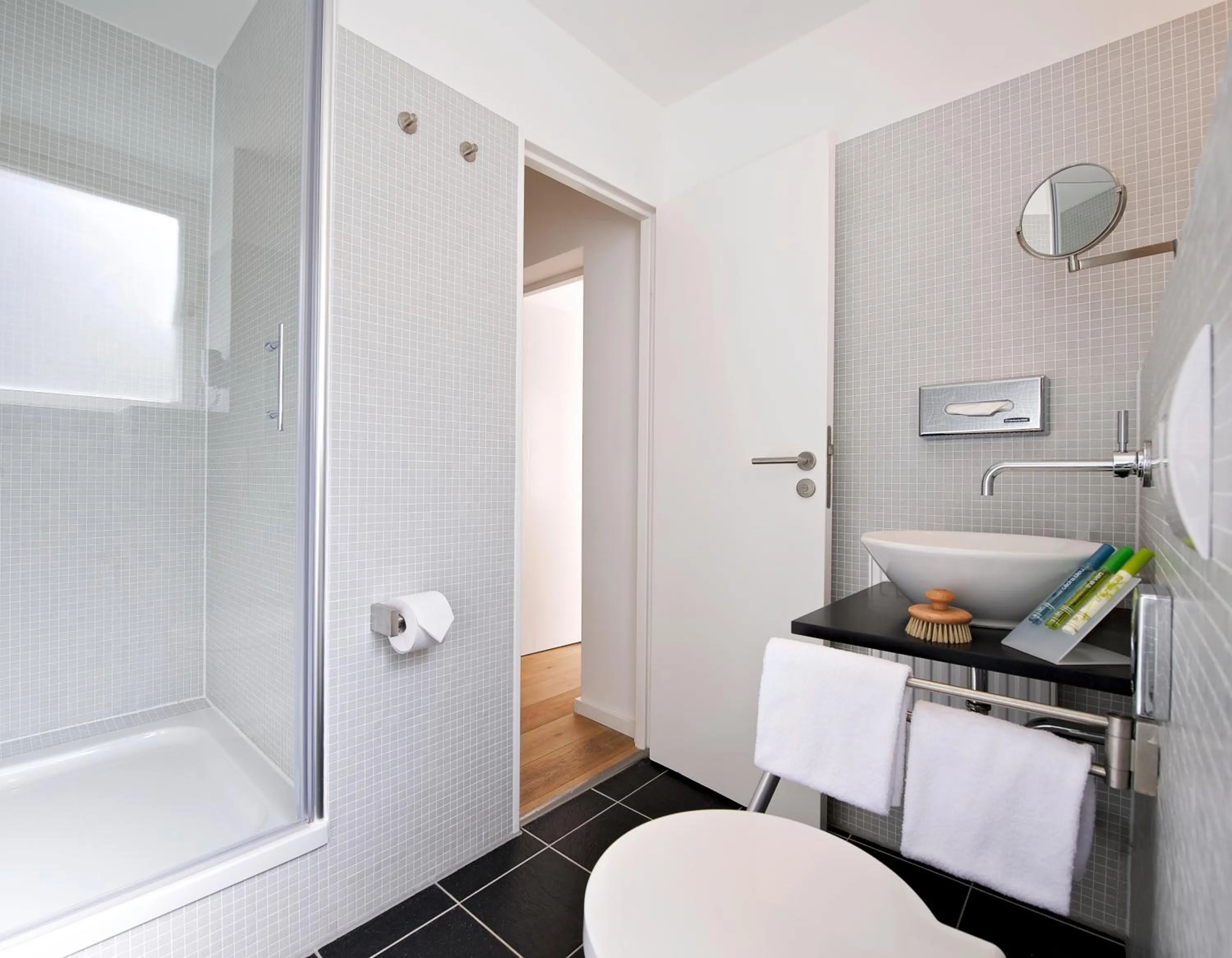 Bathroom in Art'Appart Suiten - kontaktloser Check-In