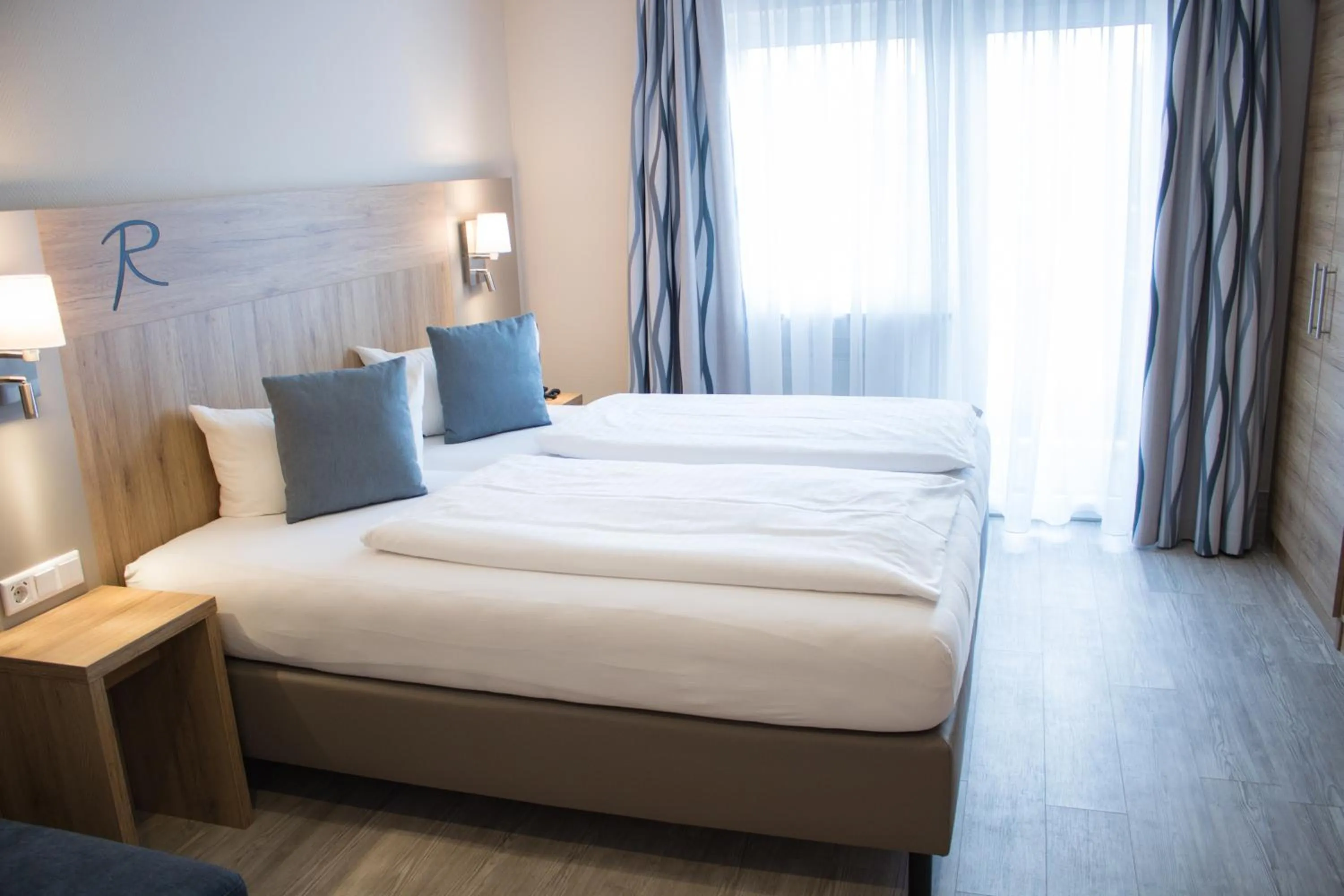 Bed in Hotel Rosenbusch