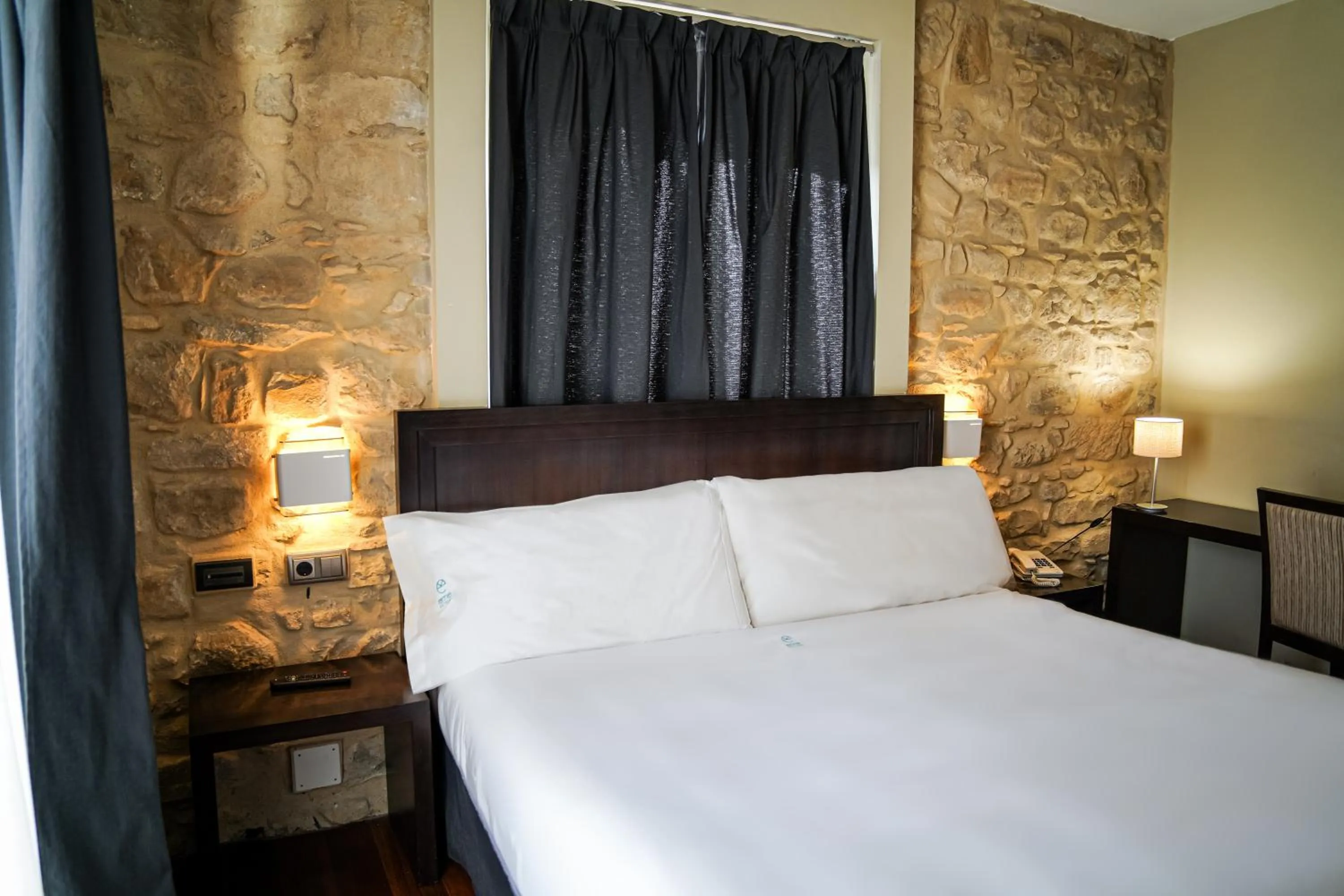 Bed in Hotel Baeza Monumental by eme hoteles