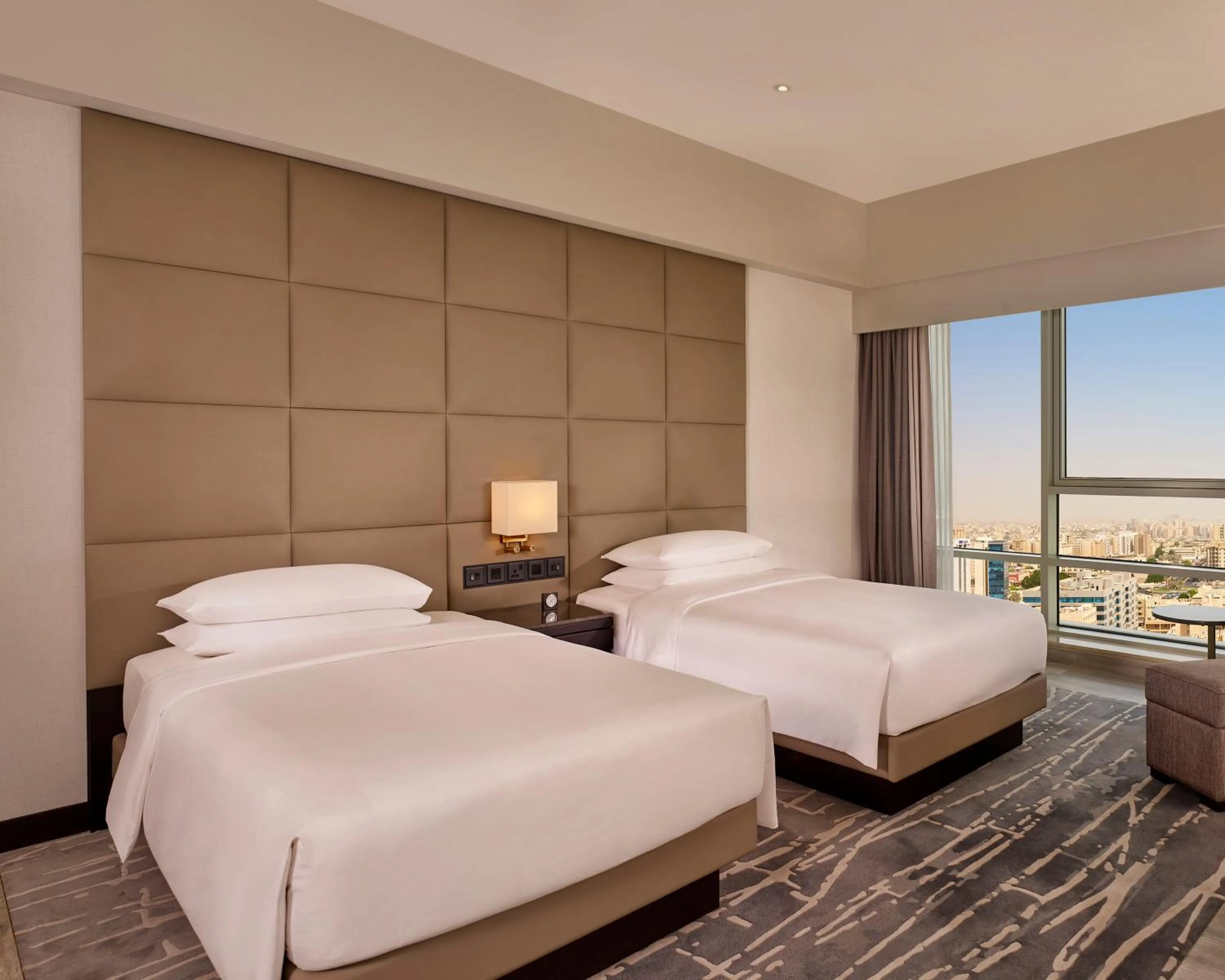 Photo of the whole room, Bed in Hyatt Regency Al Kout Mall