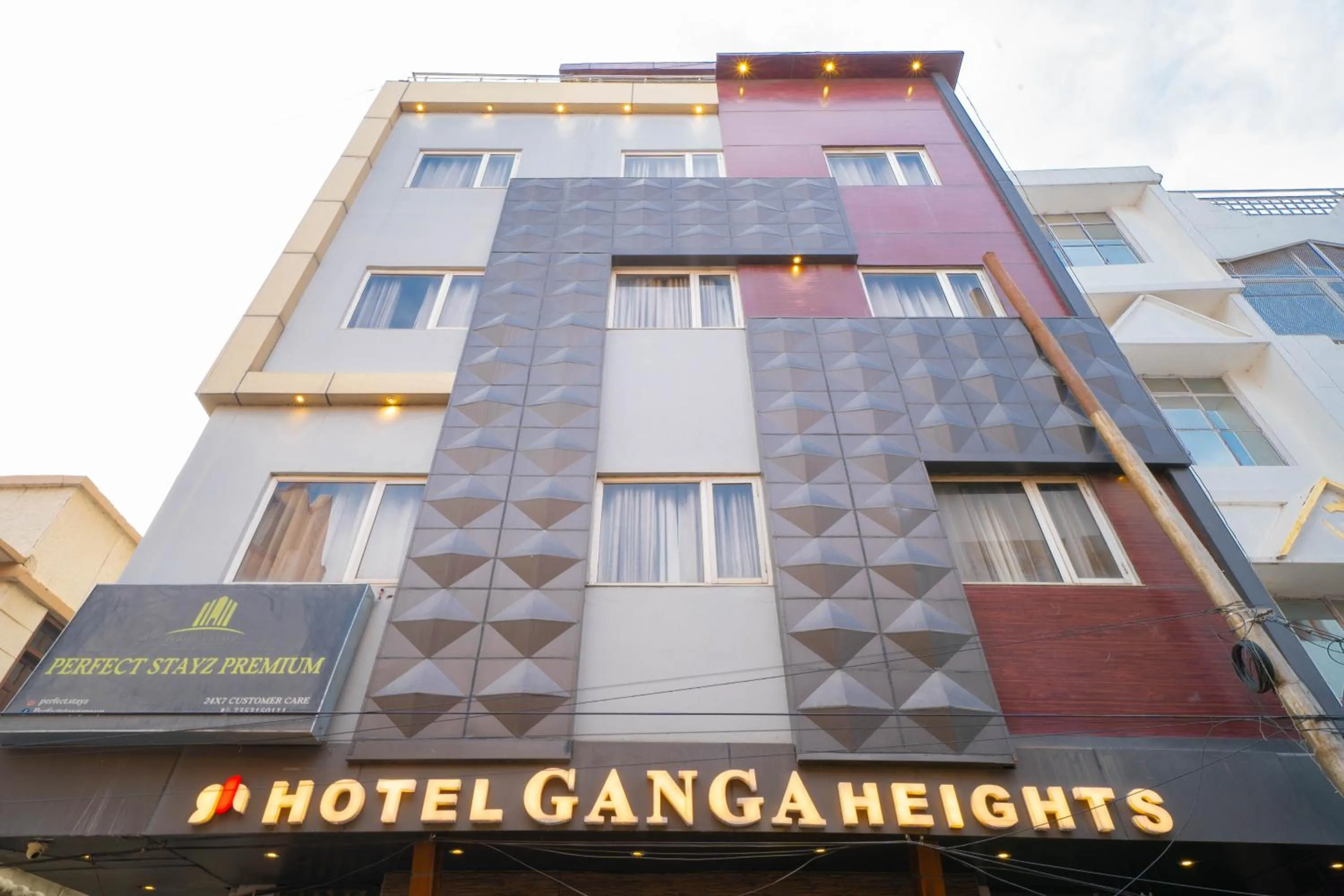 Property building in Perfectstayz Premium Ganga Heights - Ganga View rooftop cafe