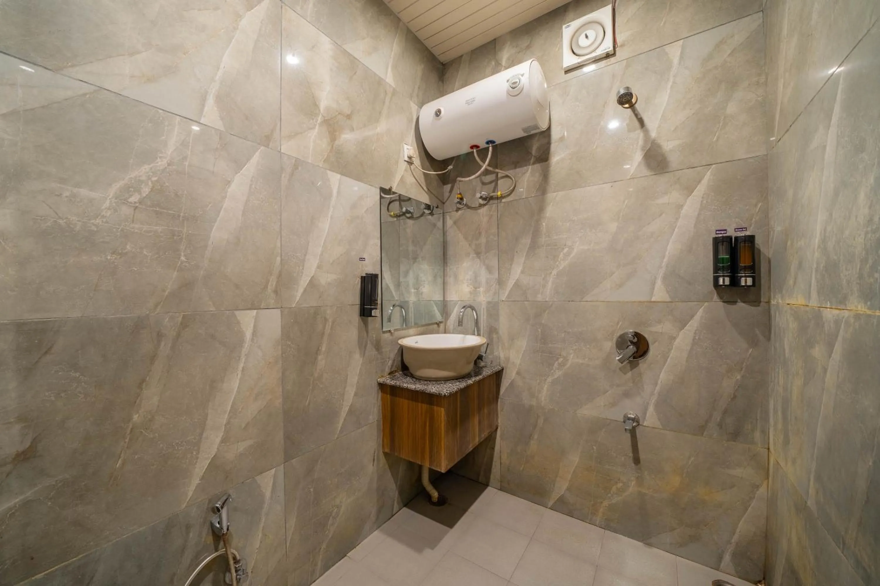 Bathroom in Perfectstayz Premium Ganga Heights - Ganga View rooftop cafe