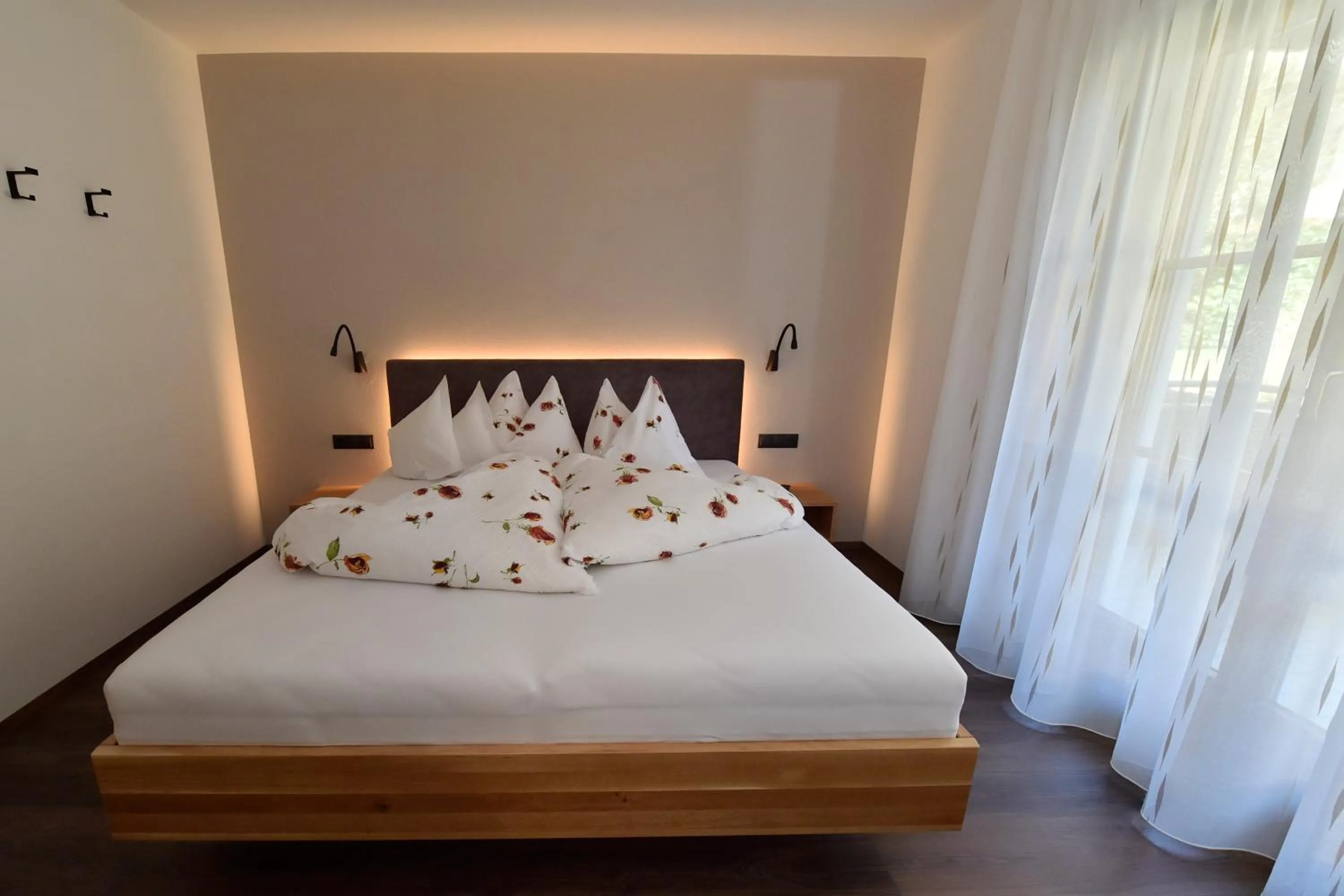 Bed in Appartements Lenzenhof