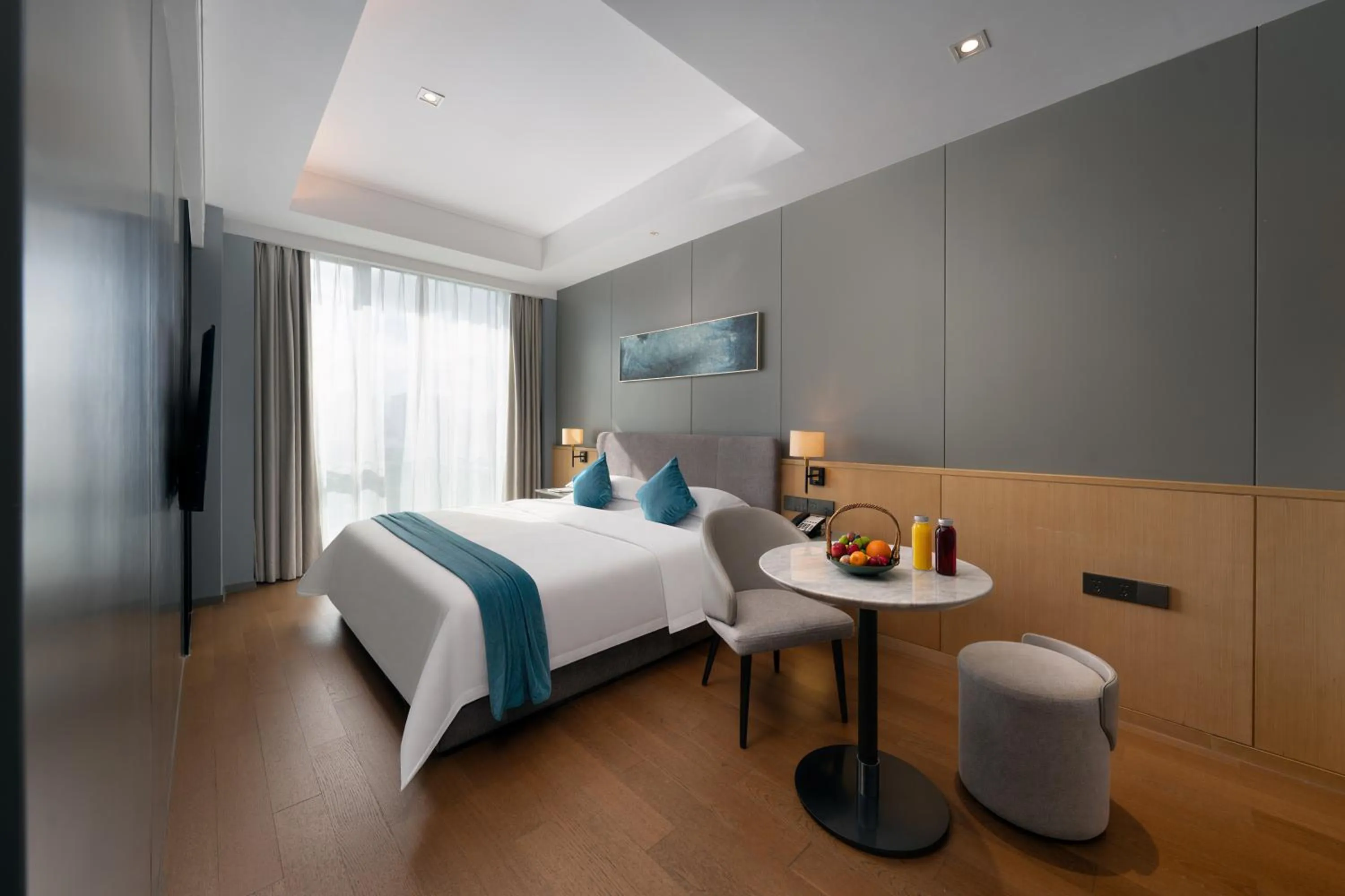 Bed in SSAW Boutique Hotel Wenzhou Dexin