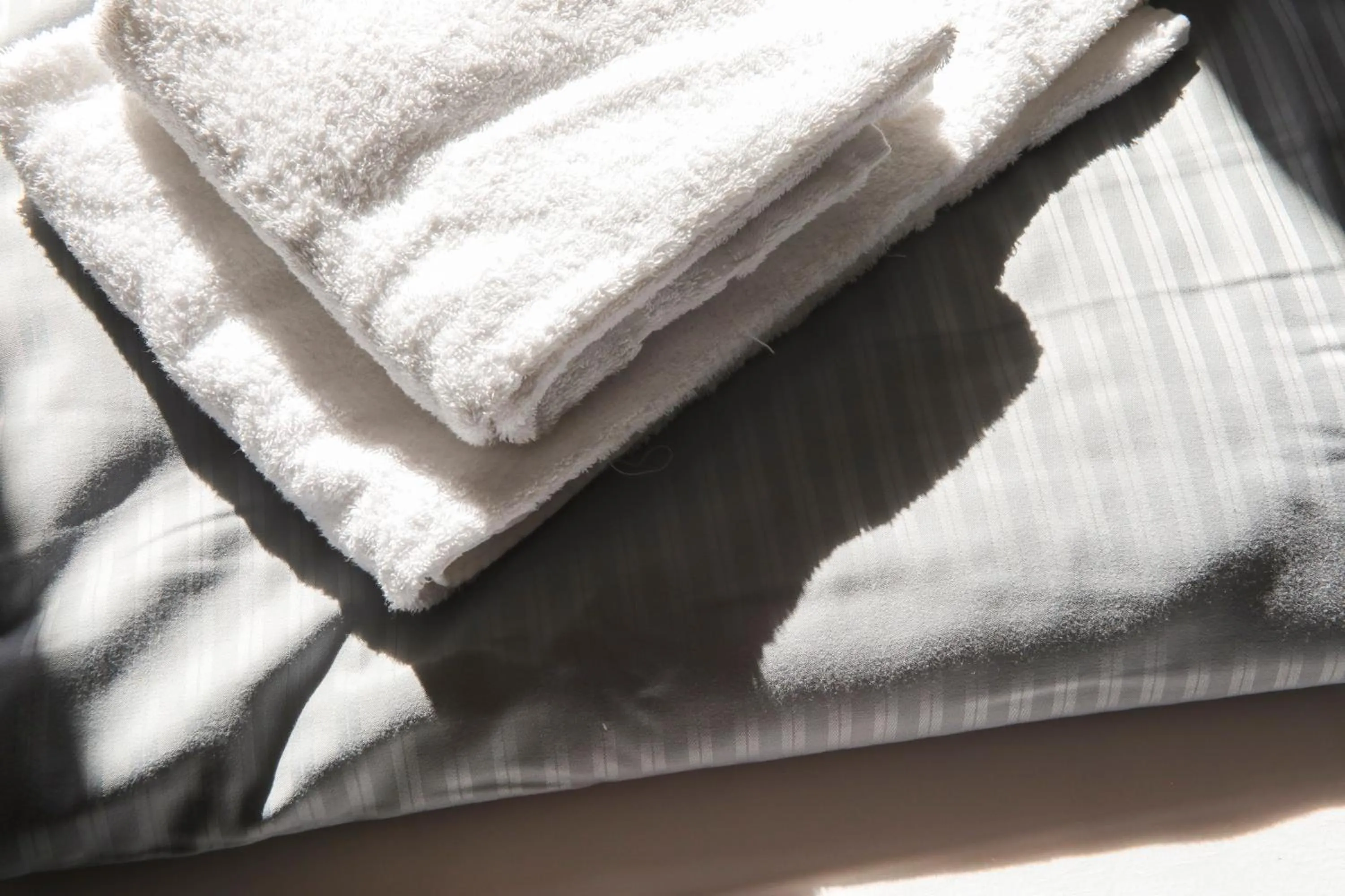 towels, Bed in acama Hotel & Hostel Kreuzberg