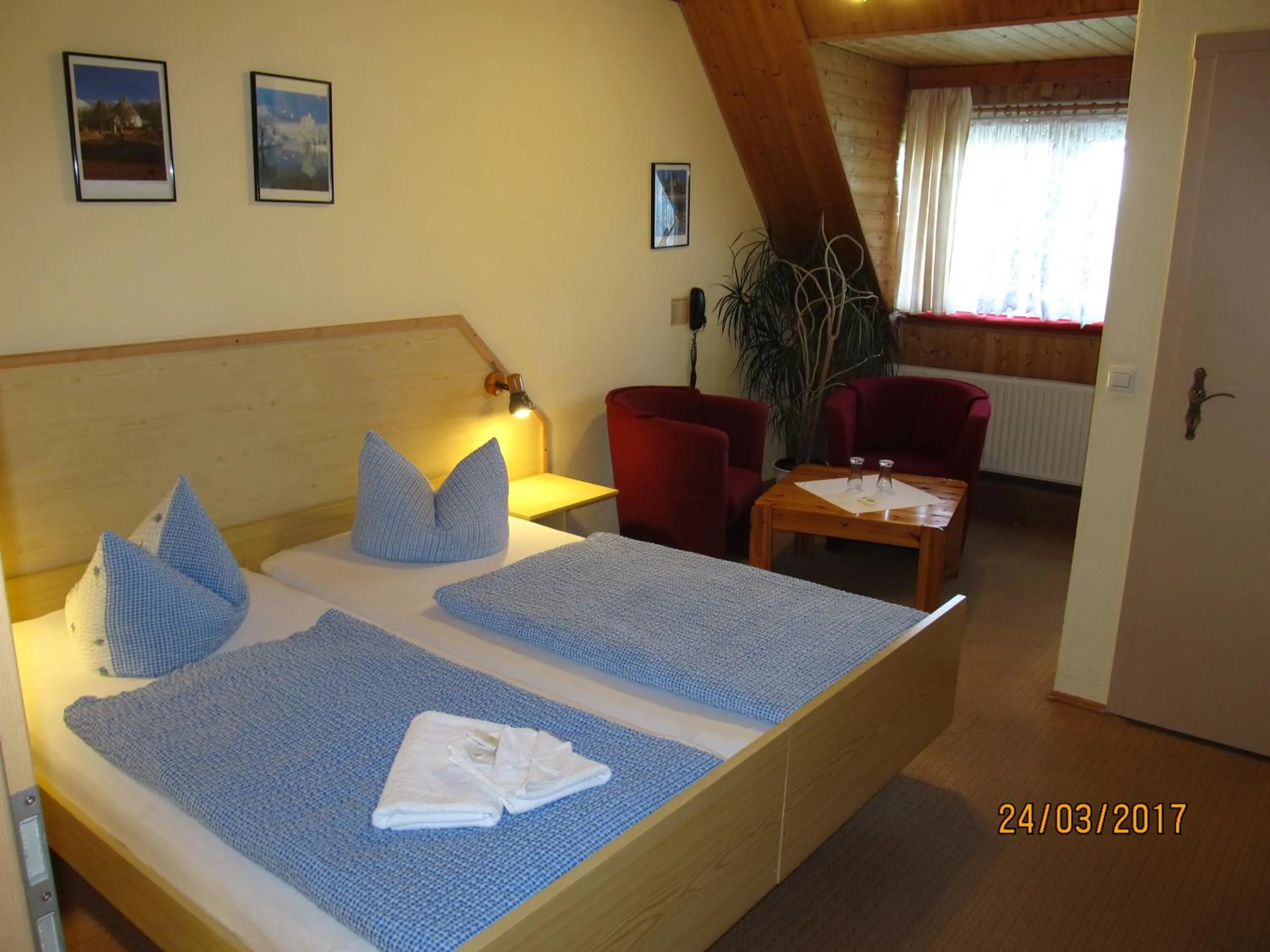 Photo of the whole room, Bed in Hotel Landhaus Nassau