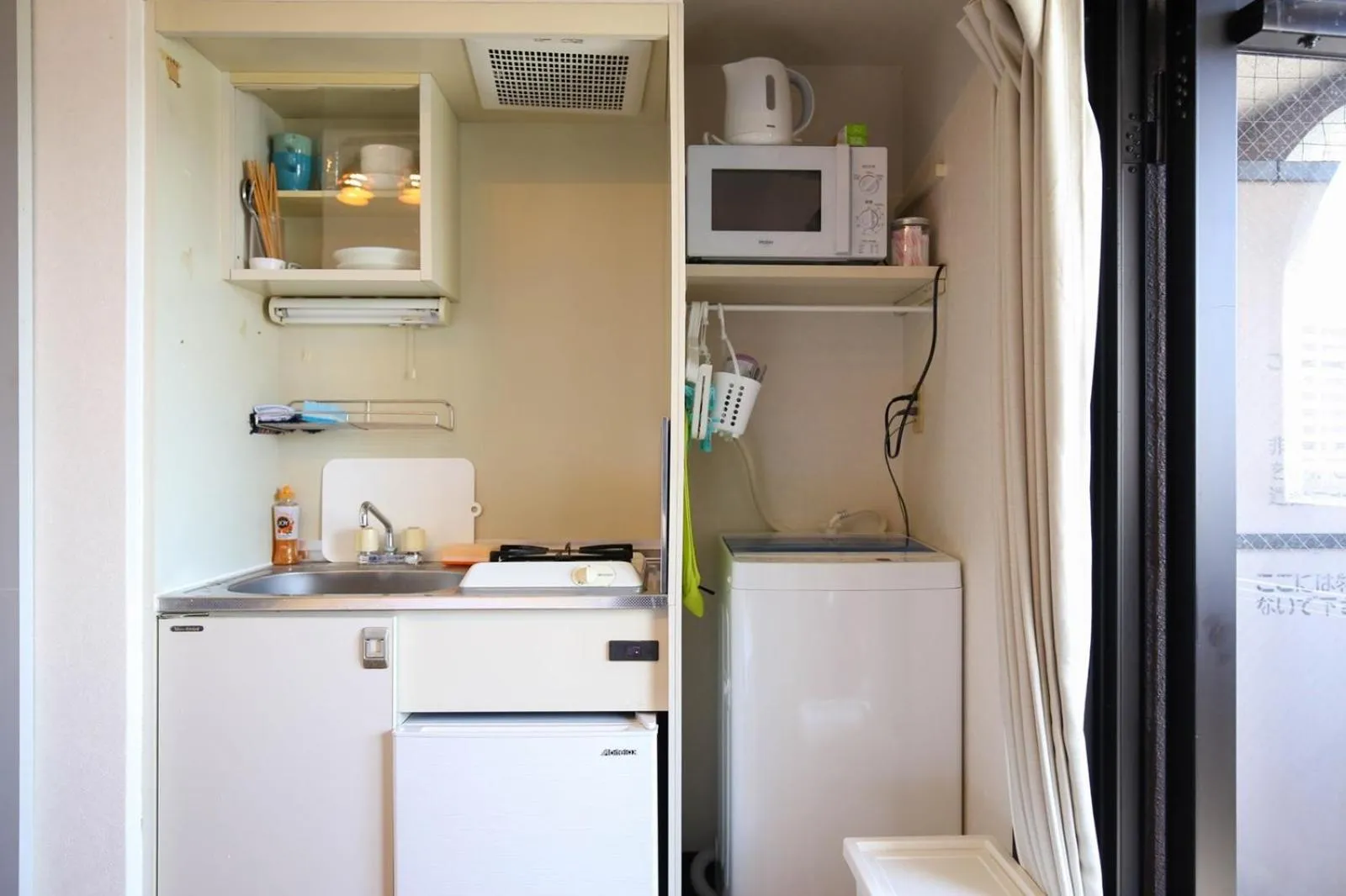 Kitchen or kitchenette in SUMIYOSHI APARTMENT Hotel 住吉アパートメントホテル