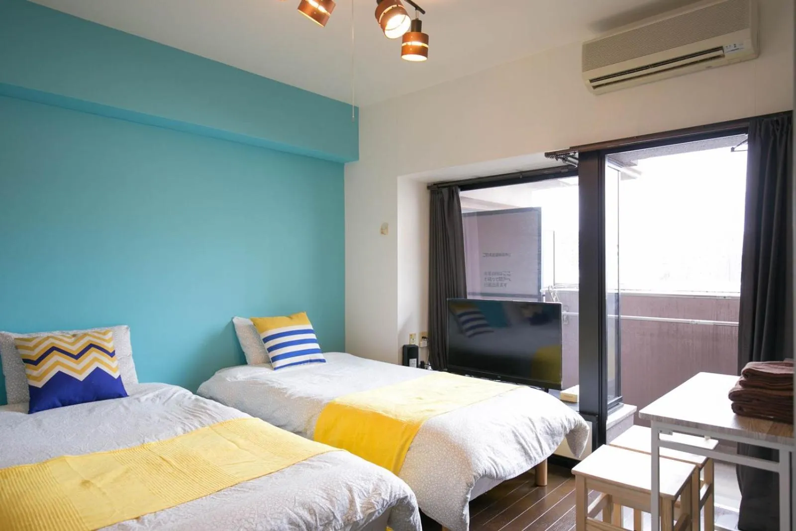 Bed in SUMIYOSHI APARTMENT Hotel 住吉アパートメントホテル