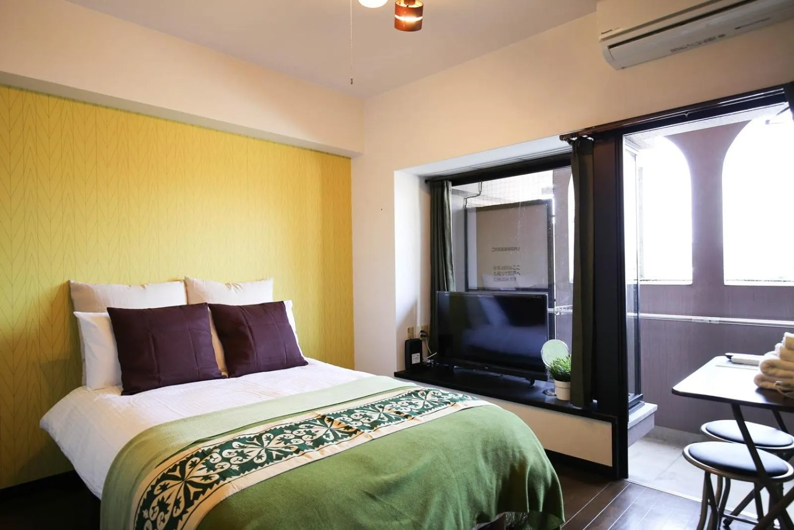 Bed in SUMIYOSHI APARTMENT Hotel 住吉アパートメントホテル