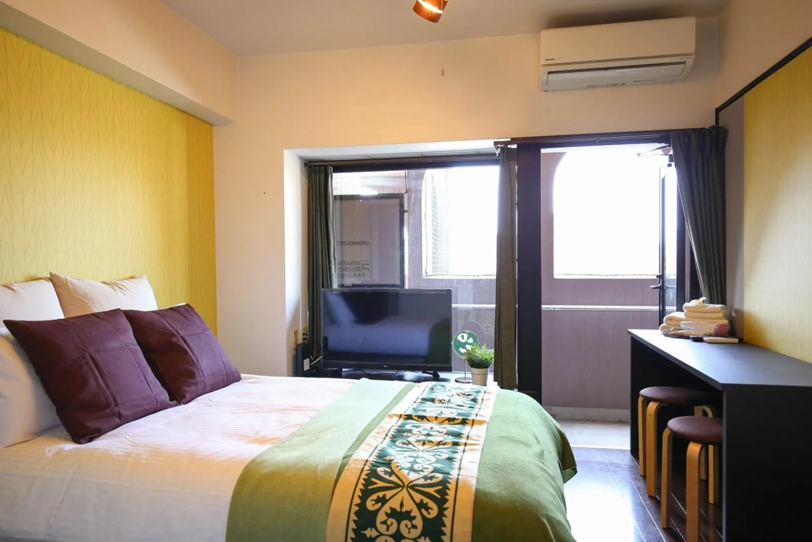 Bed in SUMIYOSHI APARTMENT Hotel 住吉アパートメントホテル