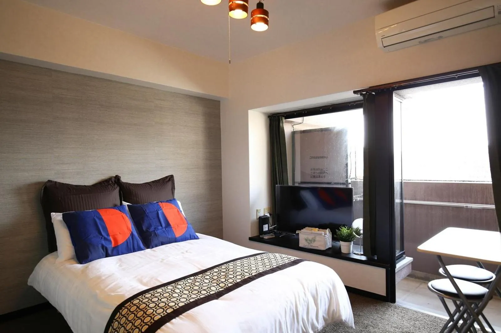 Bed in SUMIYOSHI APARTMENT Hotel 住吉アパートメントホテル