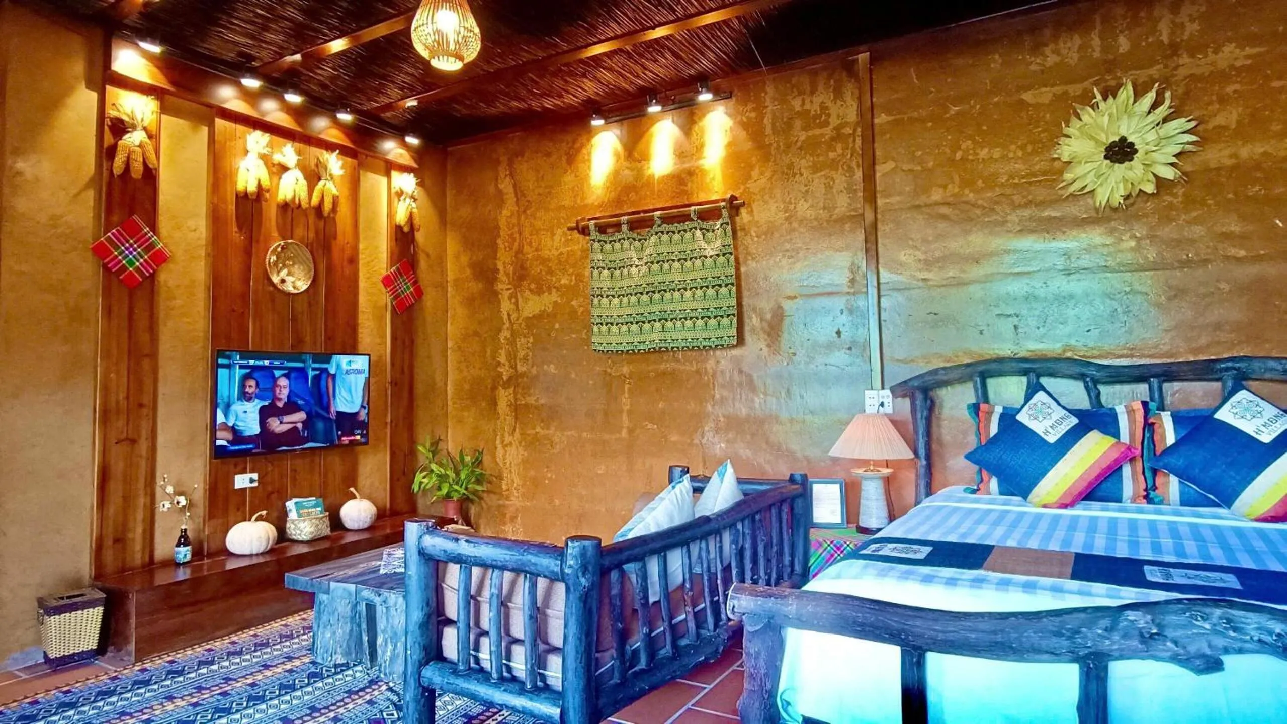 Living room, Bed in H'mong Village Resort Ha Giang