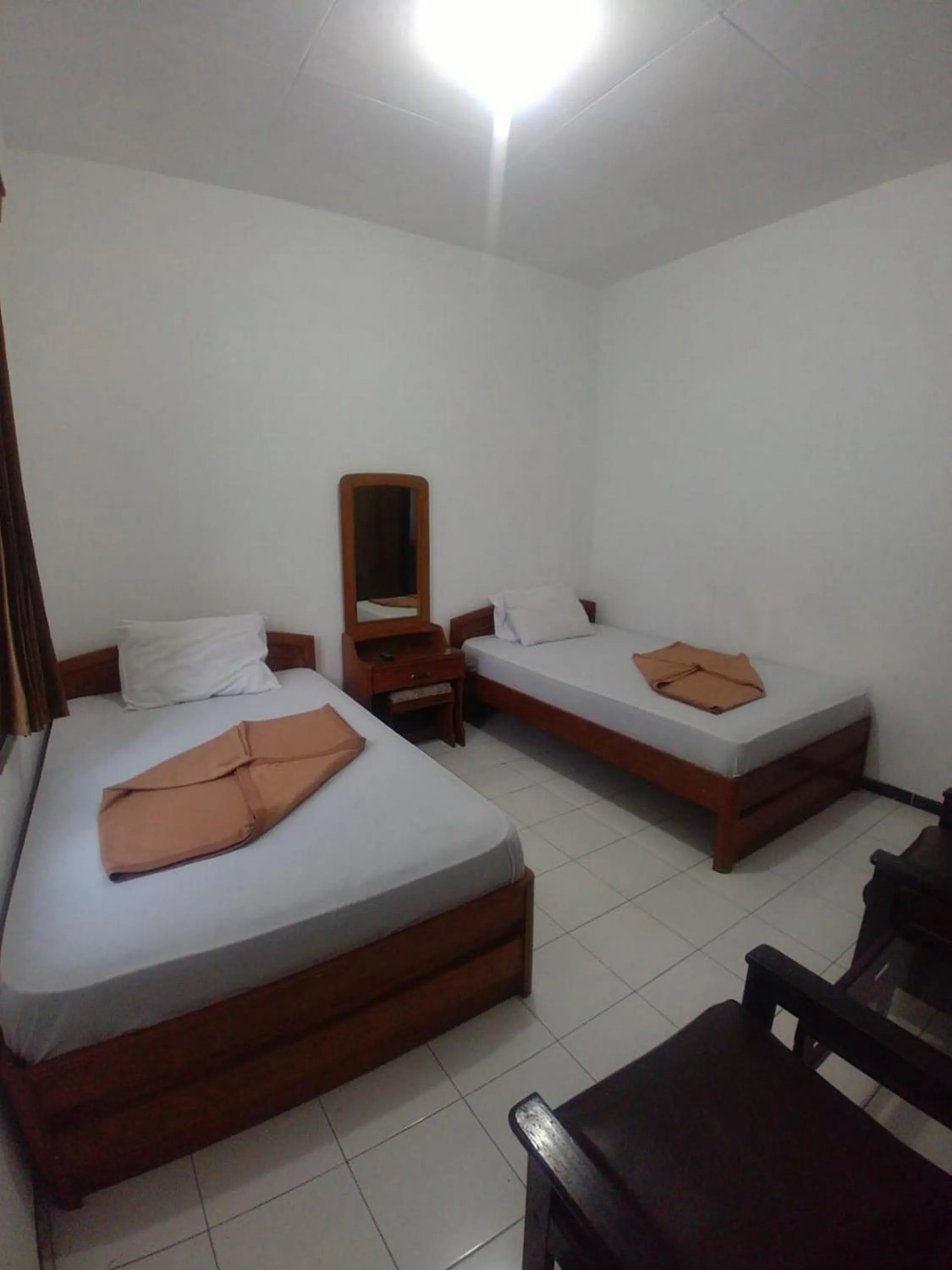 Bed in Hotel Baru Inn Batu RedPartner