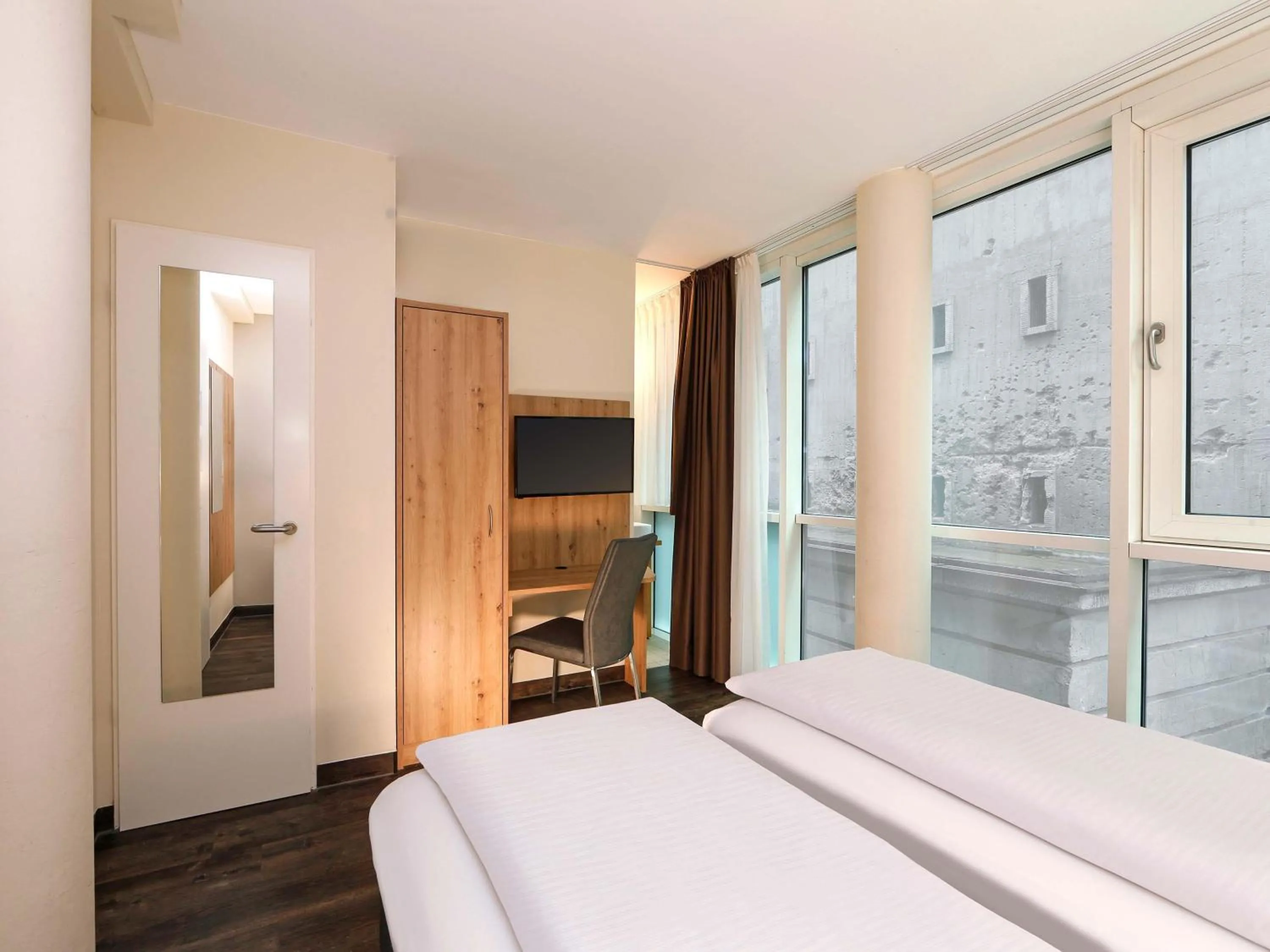 Photo of the whole room, Bed in B&B HOTEL Berlin-Mitte