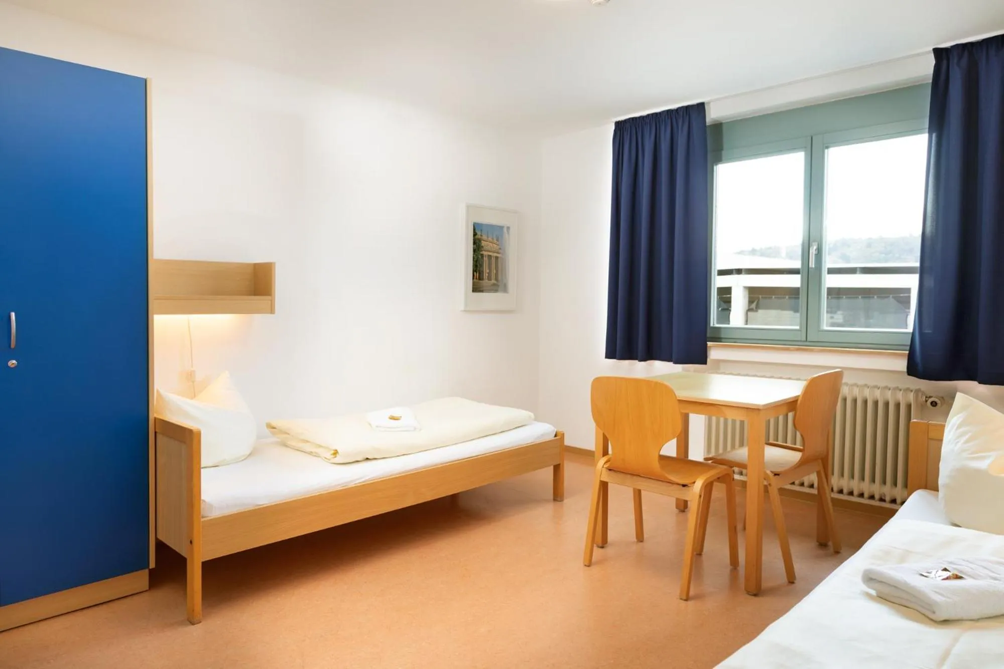 Photo of the whole room, Bed in Gästehaus abz Stuttgart
