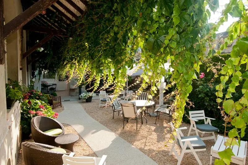 Patio in Logis Hotel Restaurant Nougier