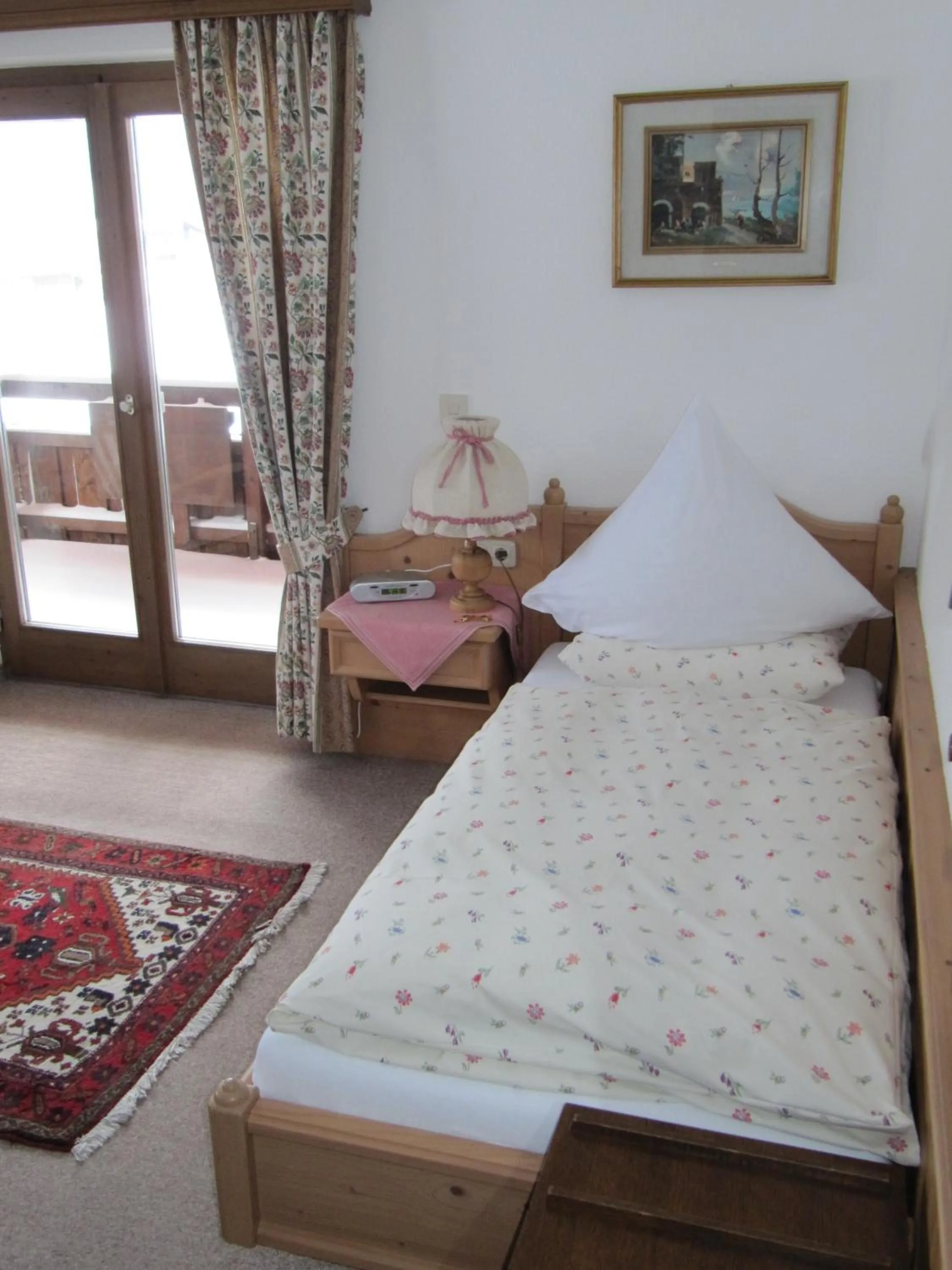 Bed in Hotel-Pension-Ostler