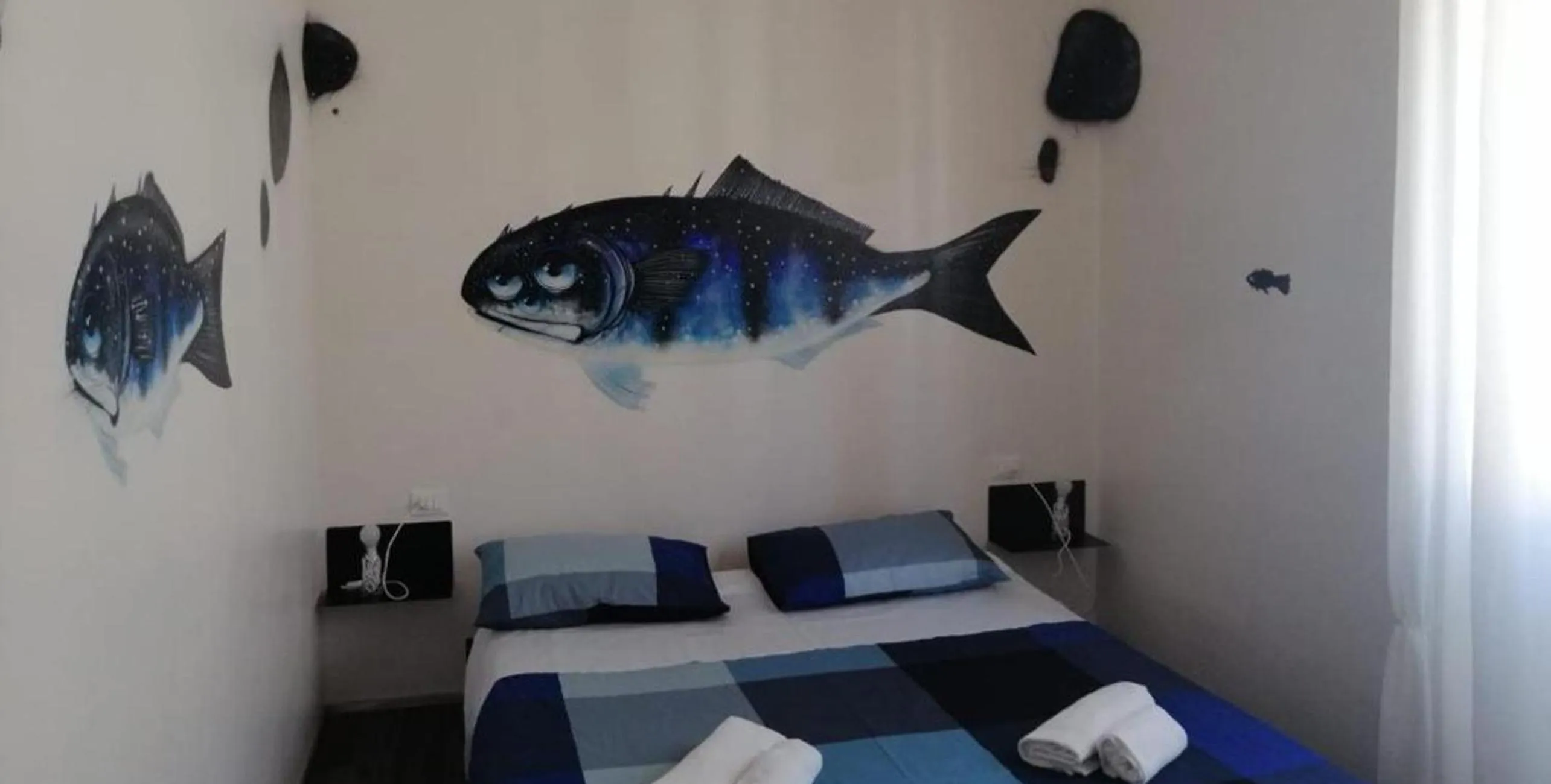 Bed in Street Art Inn Florence