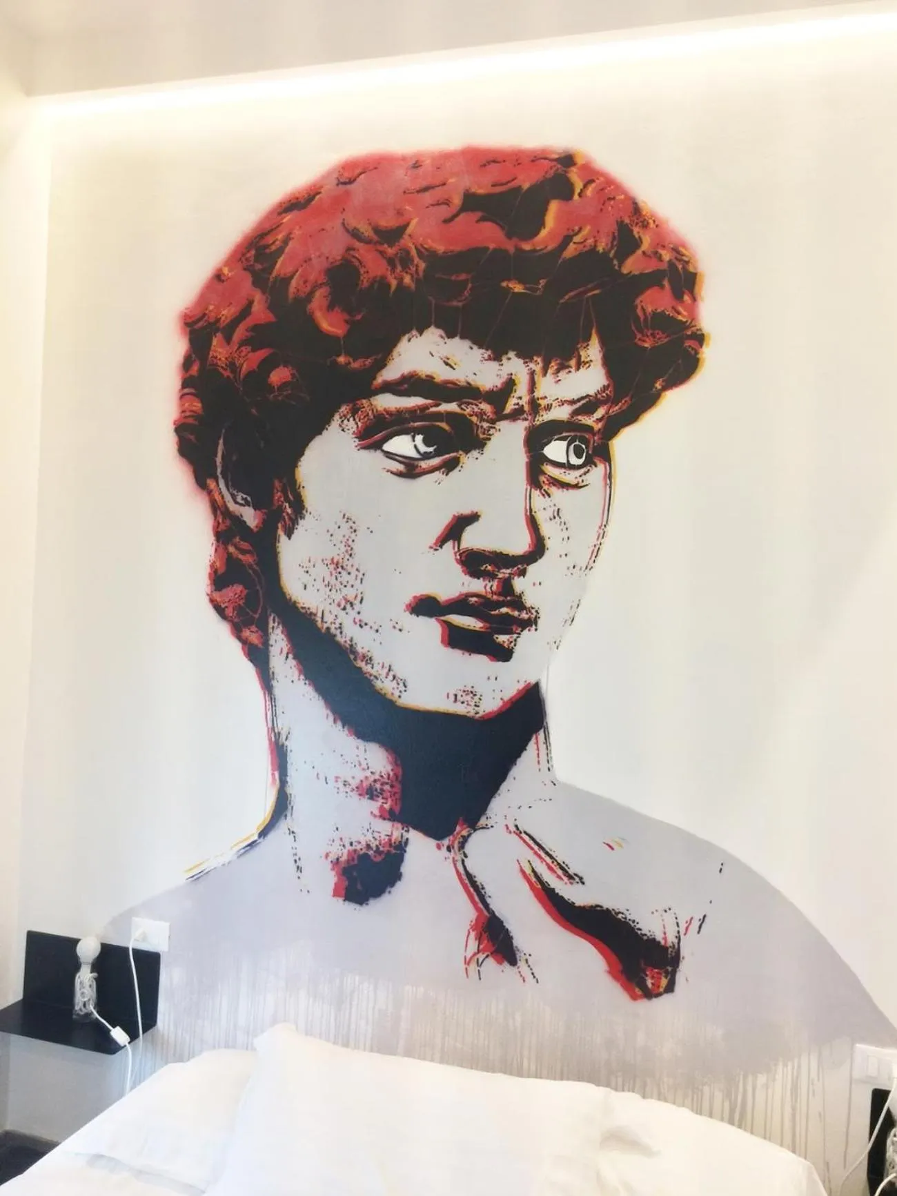 Bed in Street Art Inn Florence