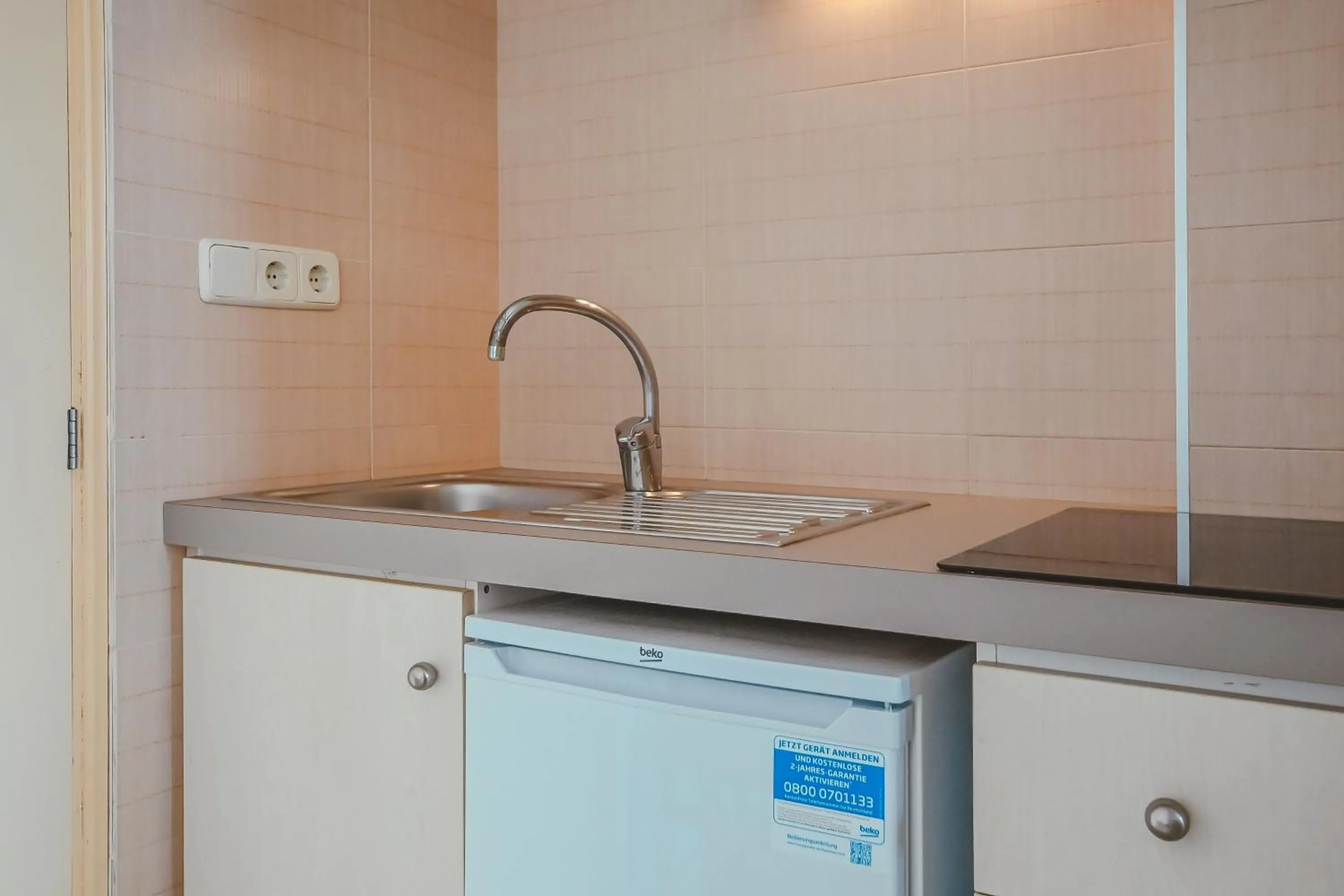 Kitchen or kitchenette in Hotel LLITERAS