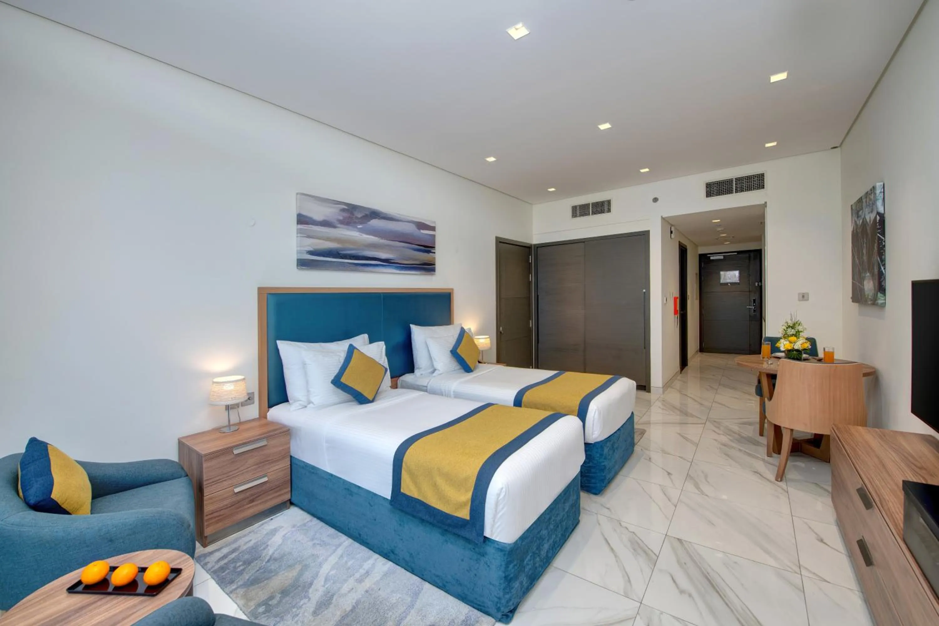 Bed in SUHA Mina Rashid Hotel Apartments