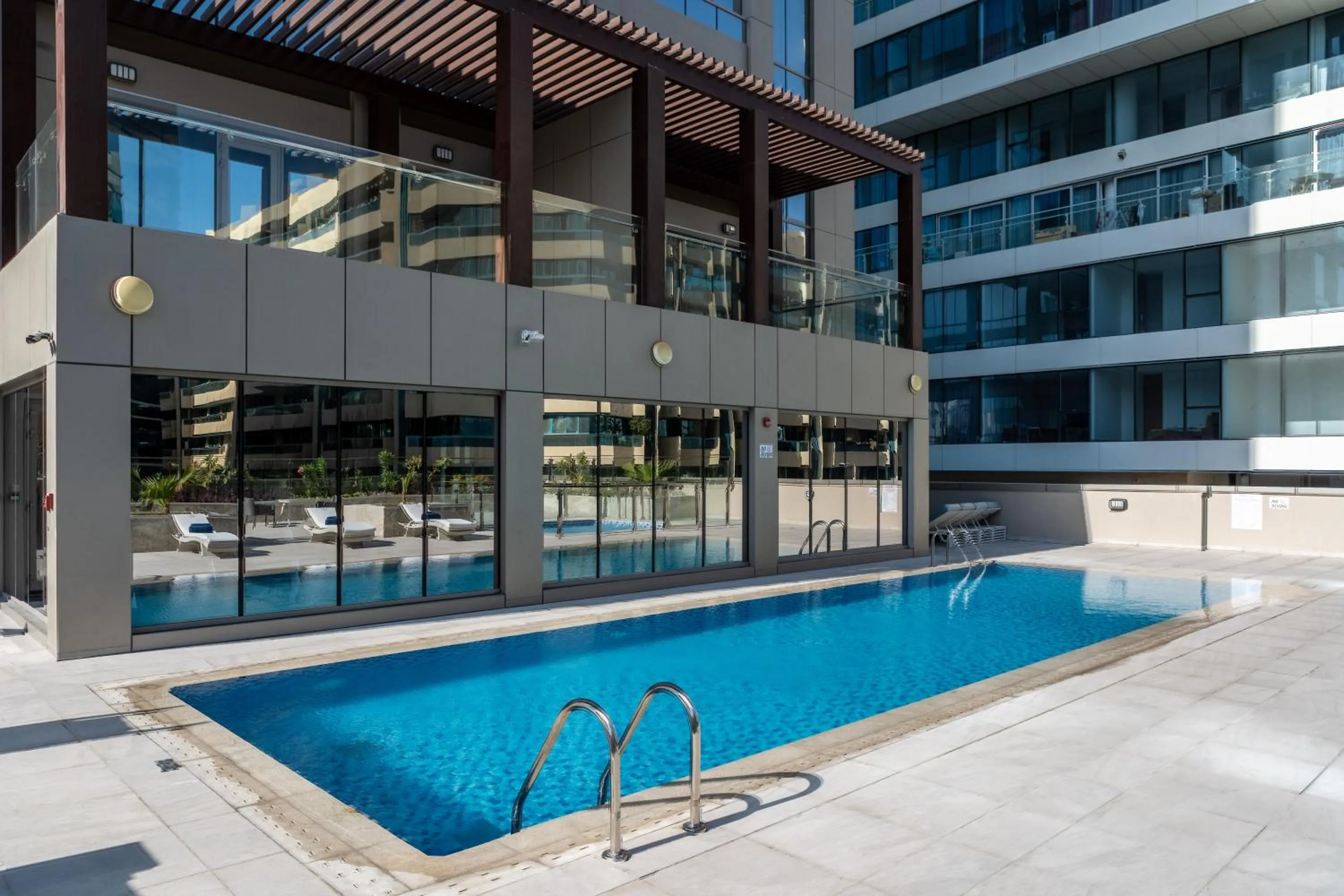 Swimming pool in SUHA Mina Rashid Hotel Apartments