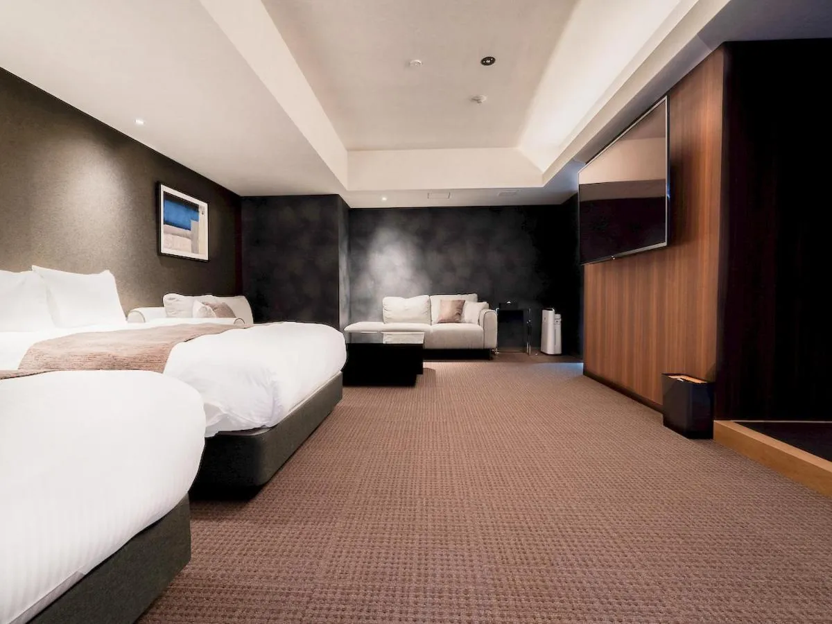 Bed in Randor Hotel Namba Osaka Suites