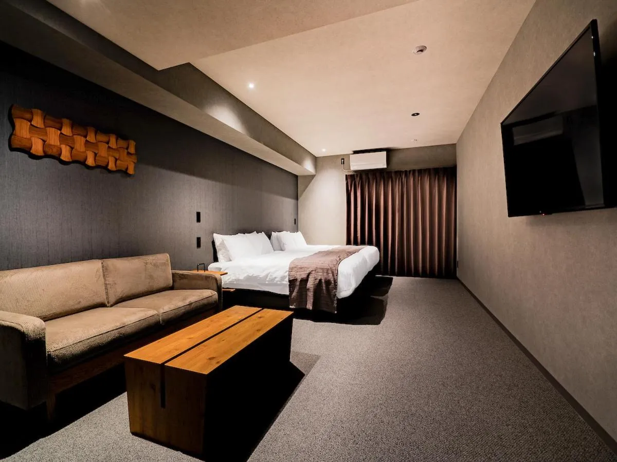 Bed in Randor Hotel Namba Osaka Suites