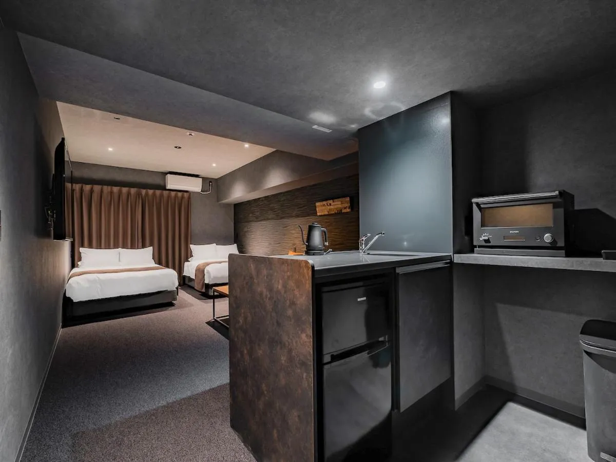 Bed in Randor Hotel Namba Osaka Suites