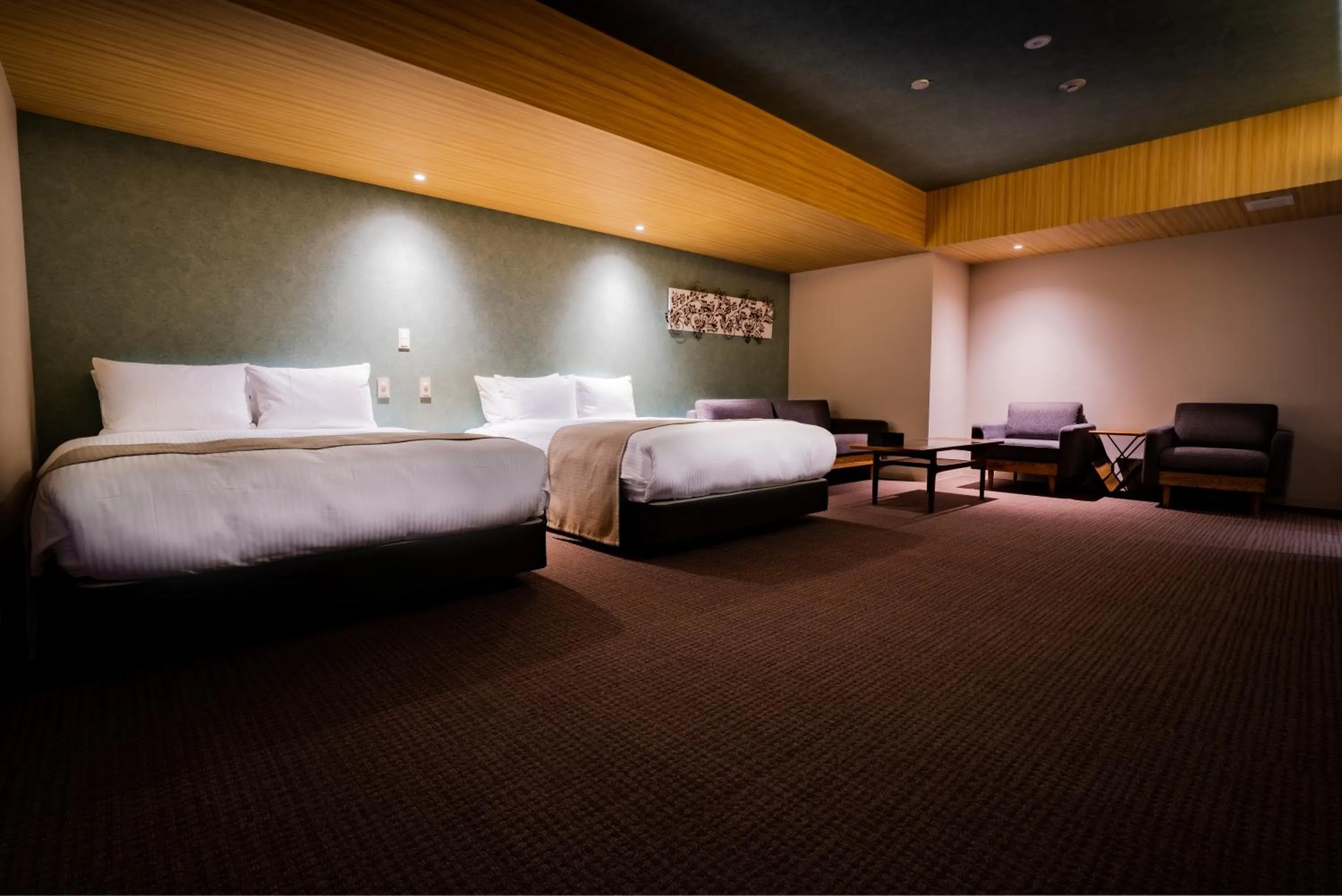 Photo of the whole room, Bed in Randor Hotel Namba Osaka Suites