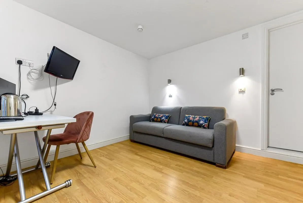 Seating area in Charlotte Street Rooms by News Hotel