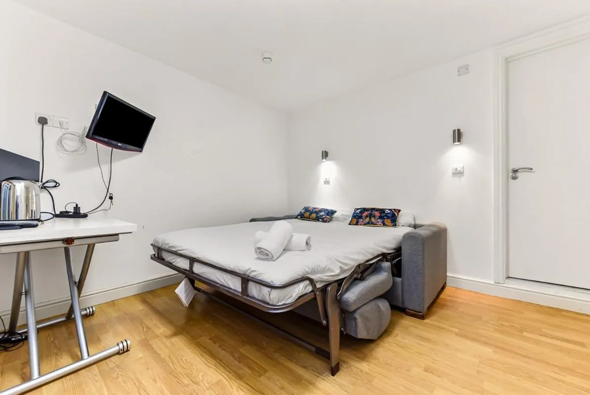 Bed in Charlotte Street Rooms by News Hotel