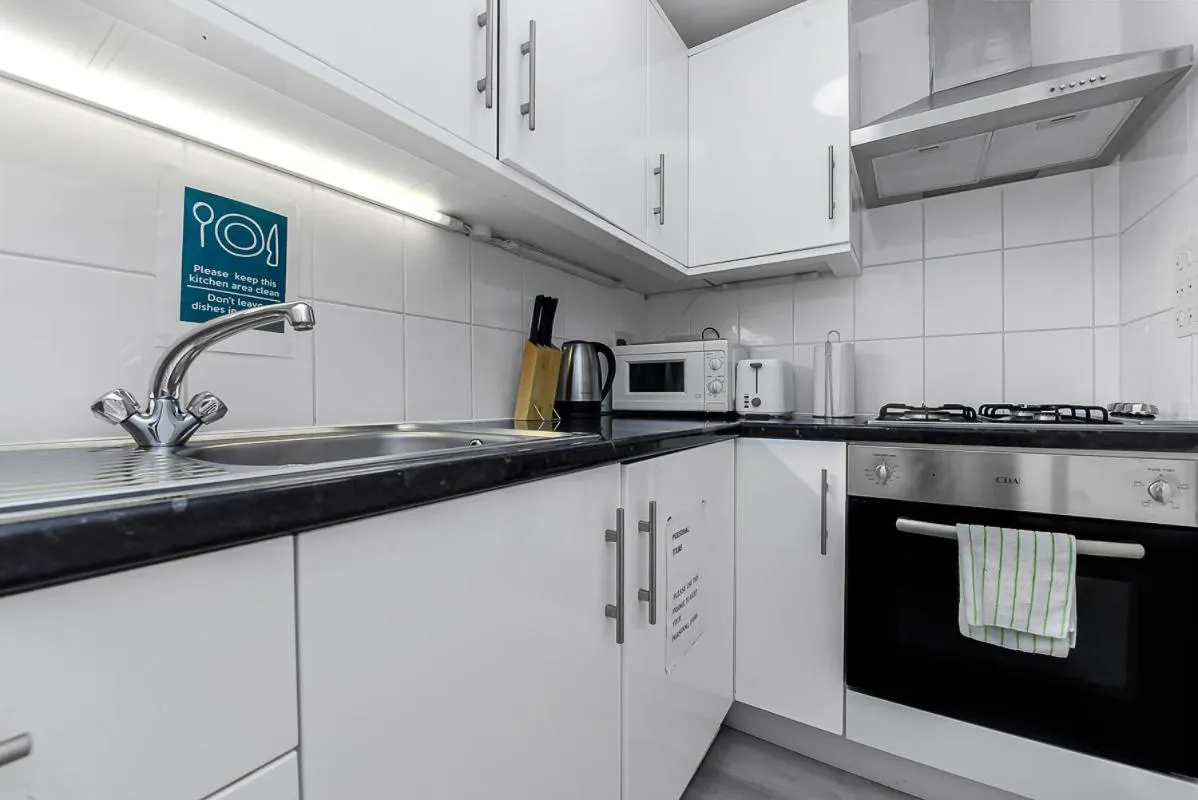 Kitchen or kitchenette in Charlotte Street Rooms by News Hotel