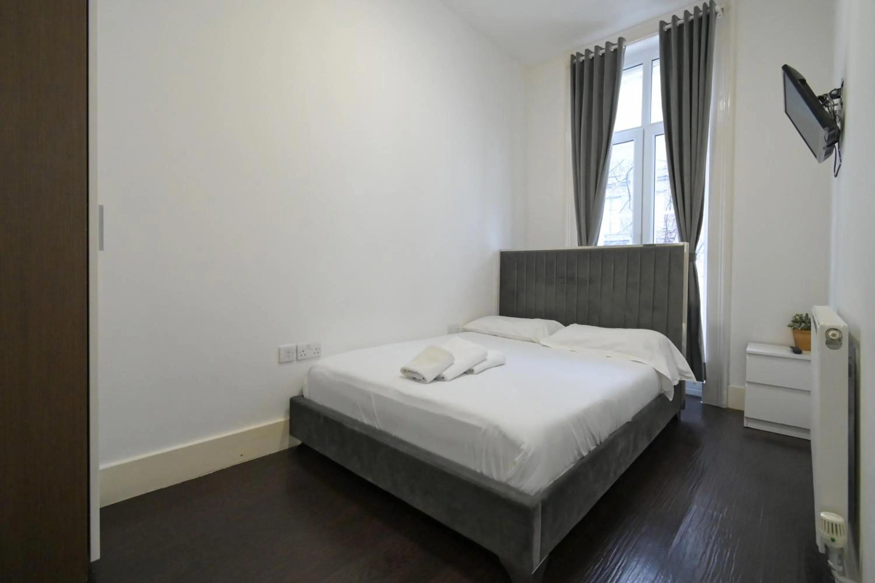 Bed in Charlotte Street Rooms by News Hotel