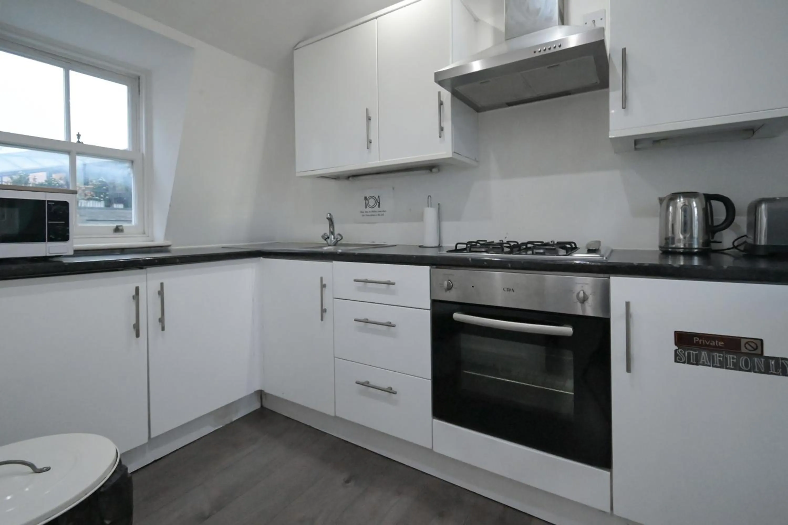 Kitchen or kitchenette in Charlotte Street Rooms by News Hotel