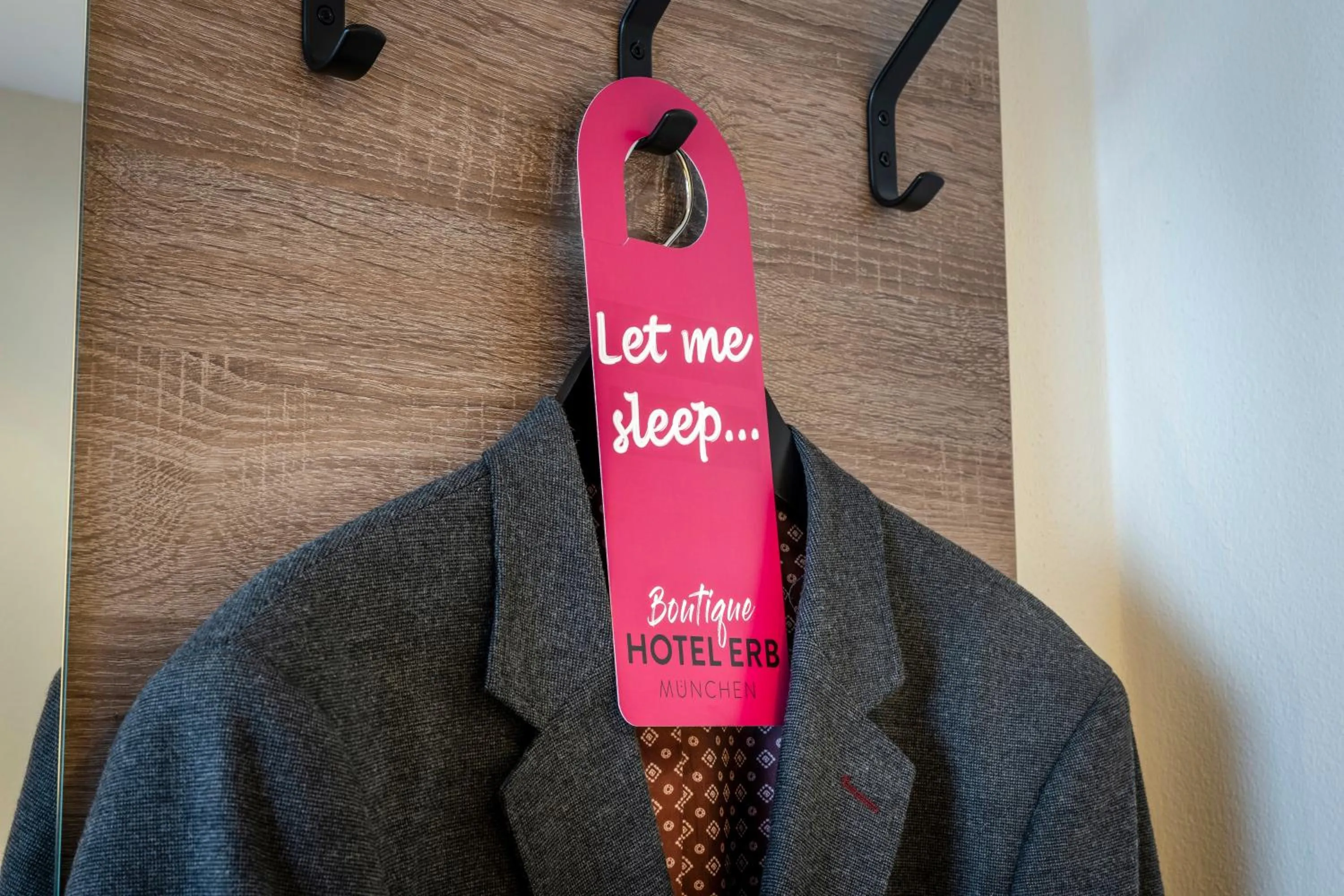 Property logo or sign in Boutique Hotel Erb München Parsdorf