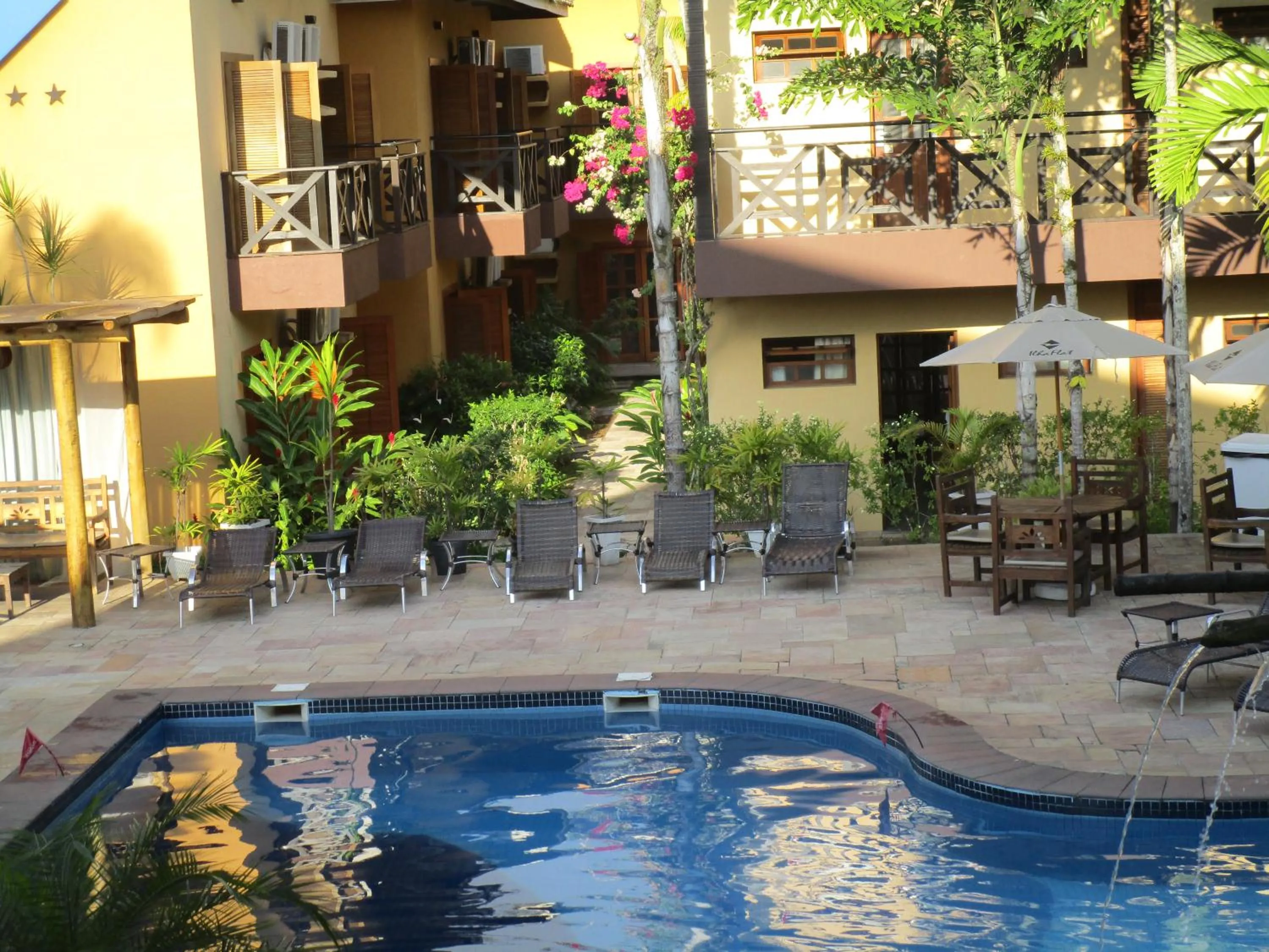 Swimming pool in Ilha flat Hotel Suíte Swaenen II