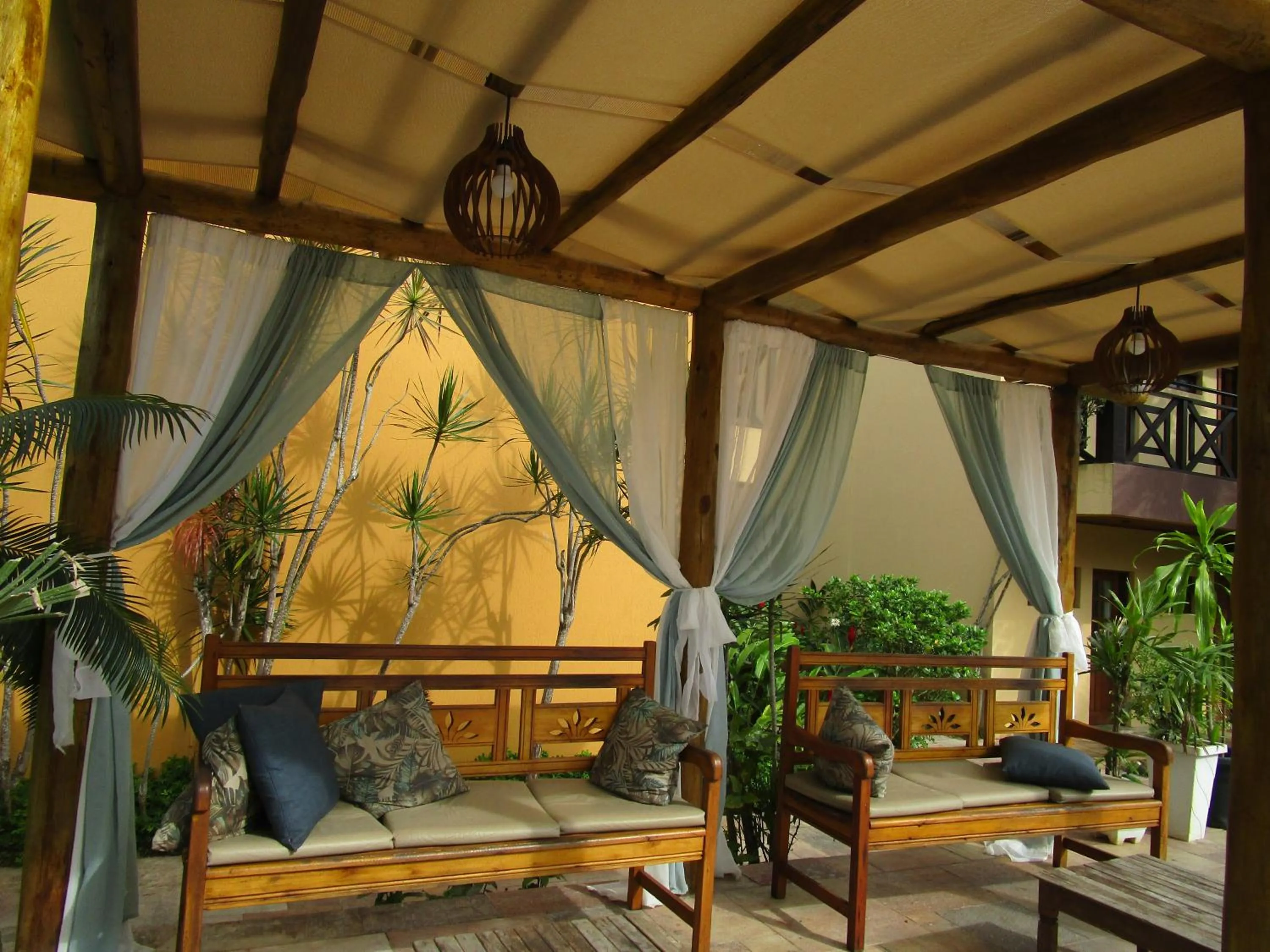 Seating area in Ilha flat Hotel Suíte Swaenen II